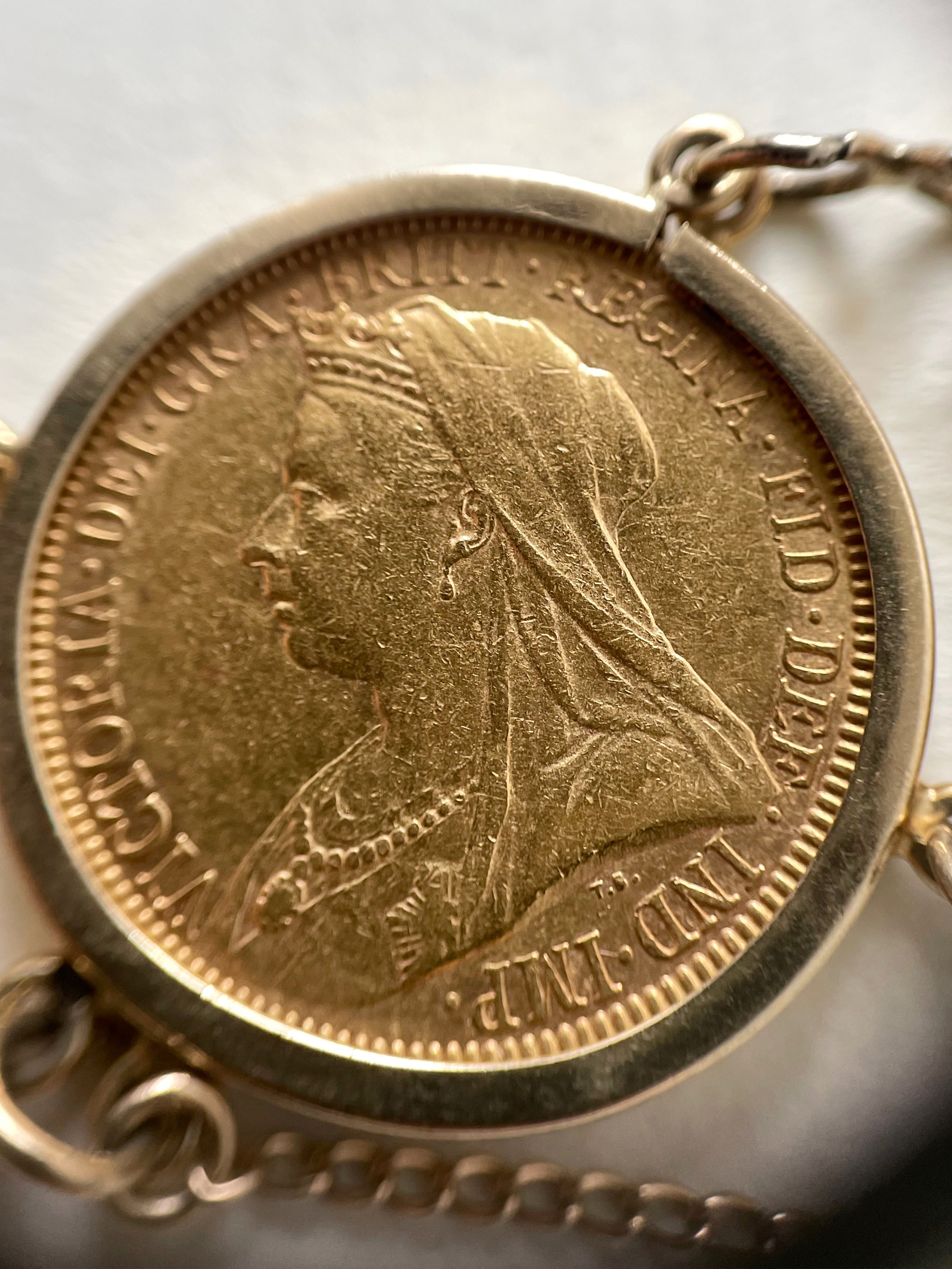Close-up of antique sovereign coin bracelet showing Jubilee Head Queen Victoria sovereign – Auric Vintage
