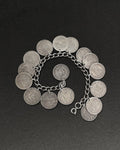 Vintage silver charm bracelet with Swiss half-franc coins and bolt ring clasp – Auric Vintage