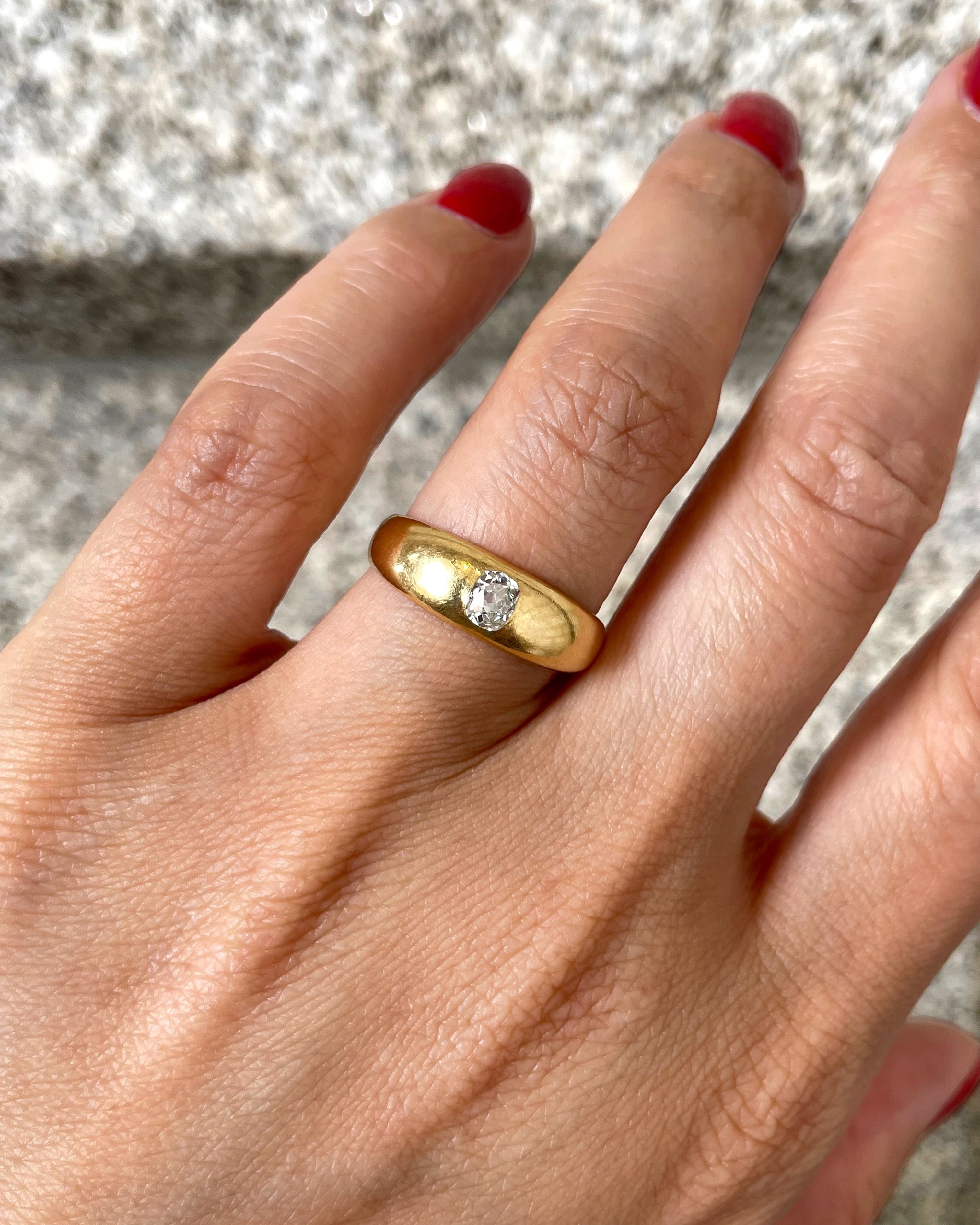 Victorian solitaire diamond ring in 18kt yellow gold worn on hand showing scale and old mine cut diamond – Auric Vintage