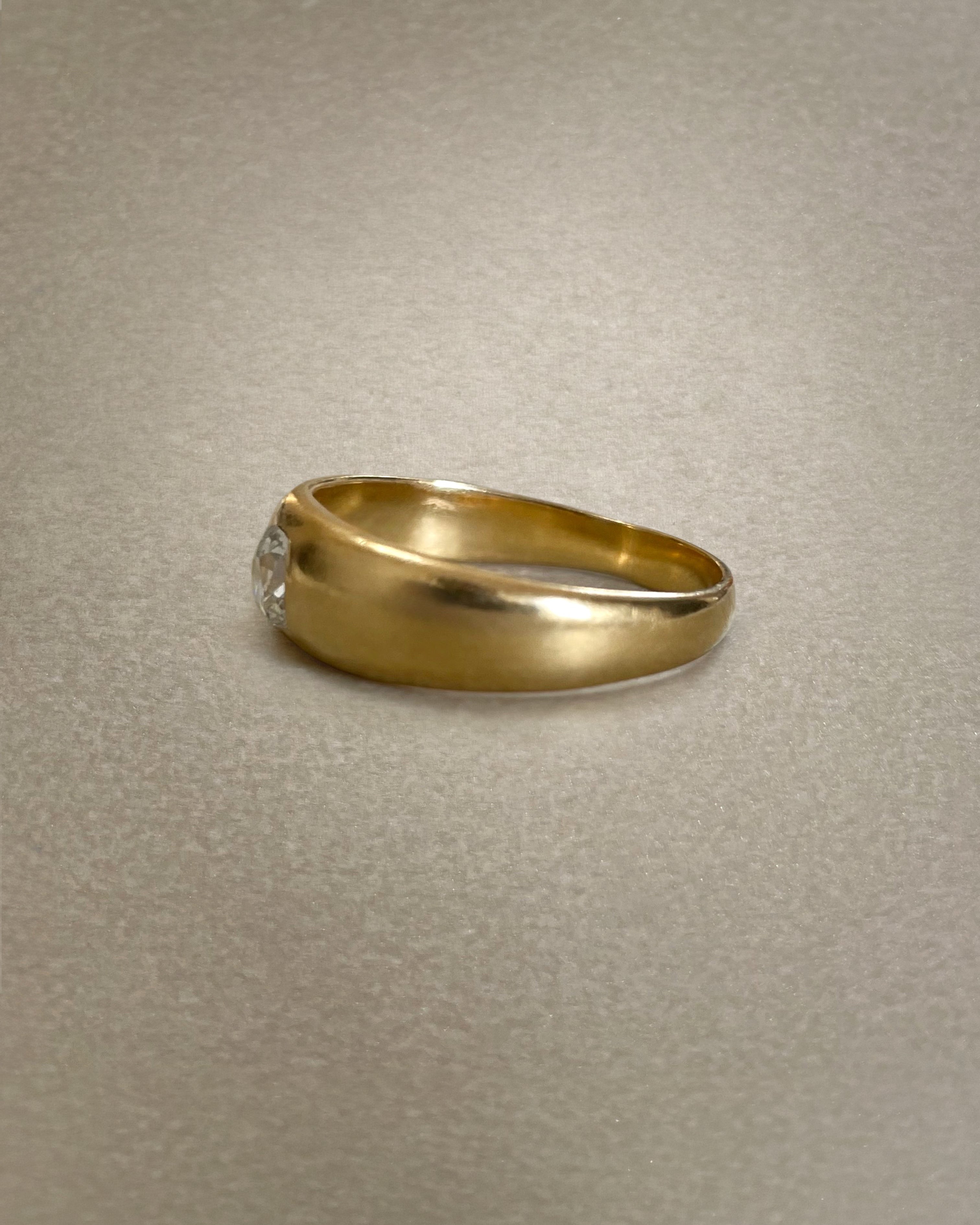 Side view of Victorian solitaire diamond ring in 18kt yellow gold showing bombe profile and solid shank – Auric Vintage