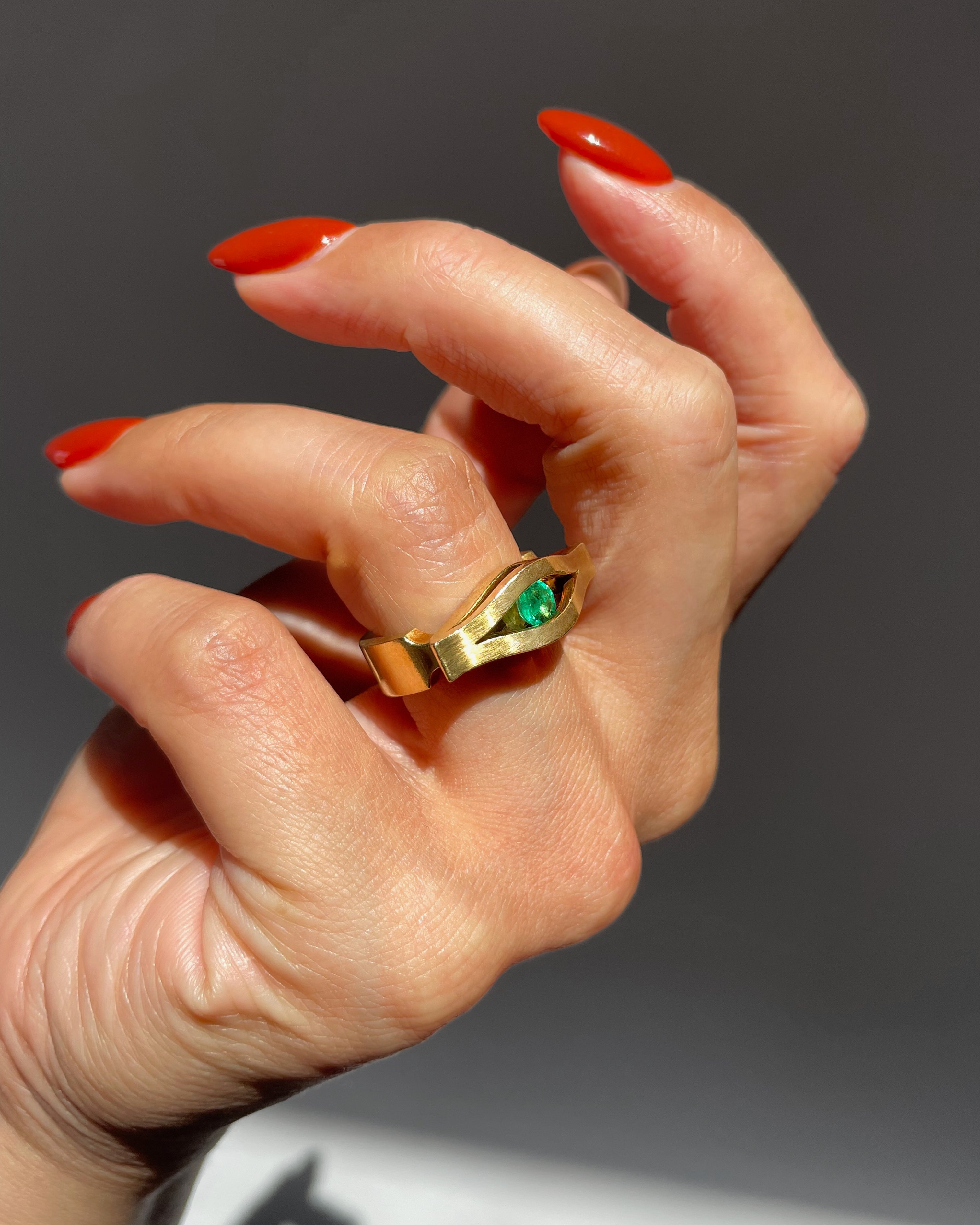 Modernist French emerald iris ring in 18kt yellow gold worn on hand – Auric Vintage