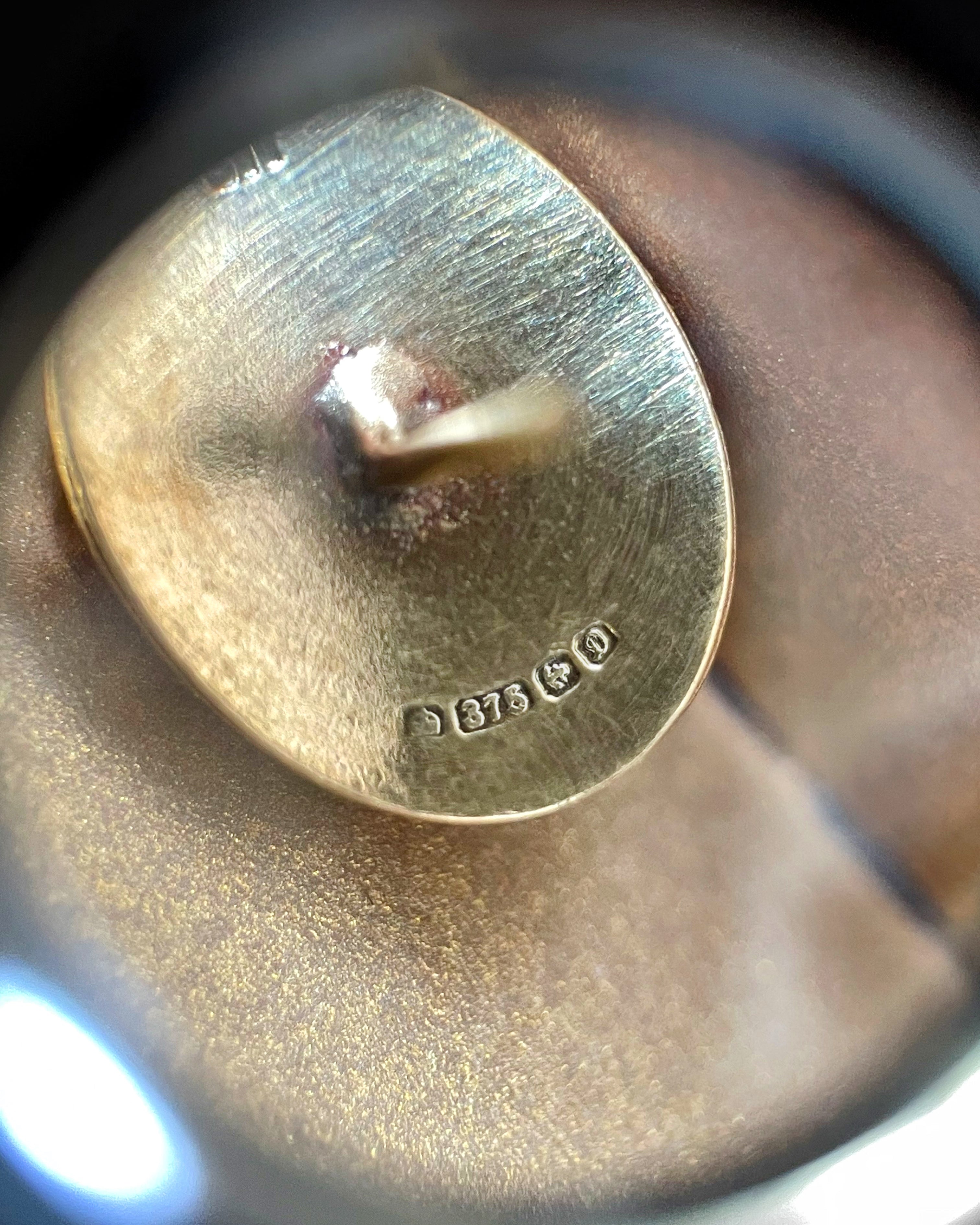 Close-up of Birmingham 1978 hallmarks on Seventies 9kt yellow gold stud earrings – Auric Vintage