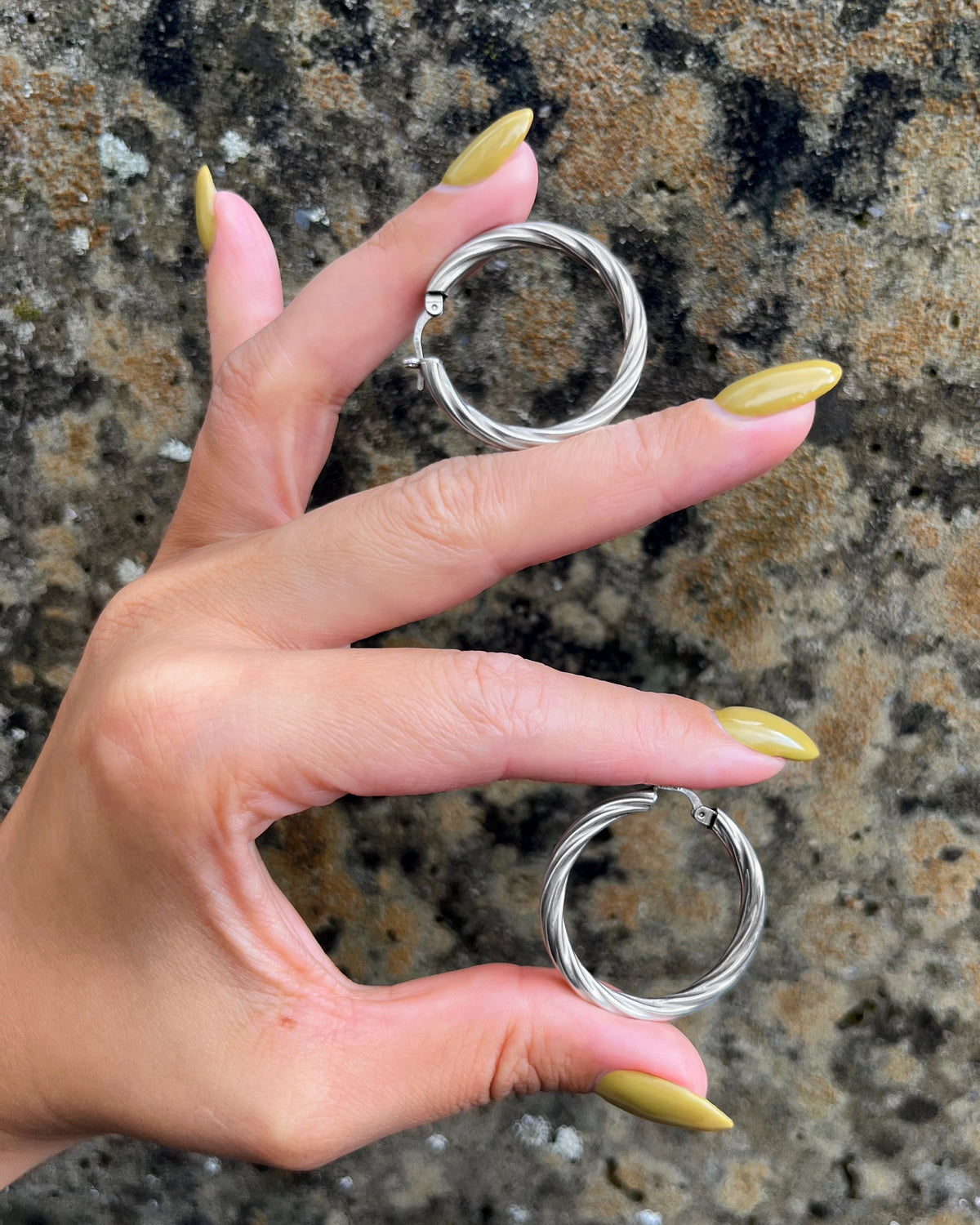 Nineties large twisted hoop earrings