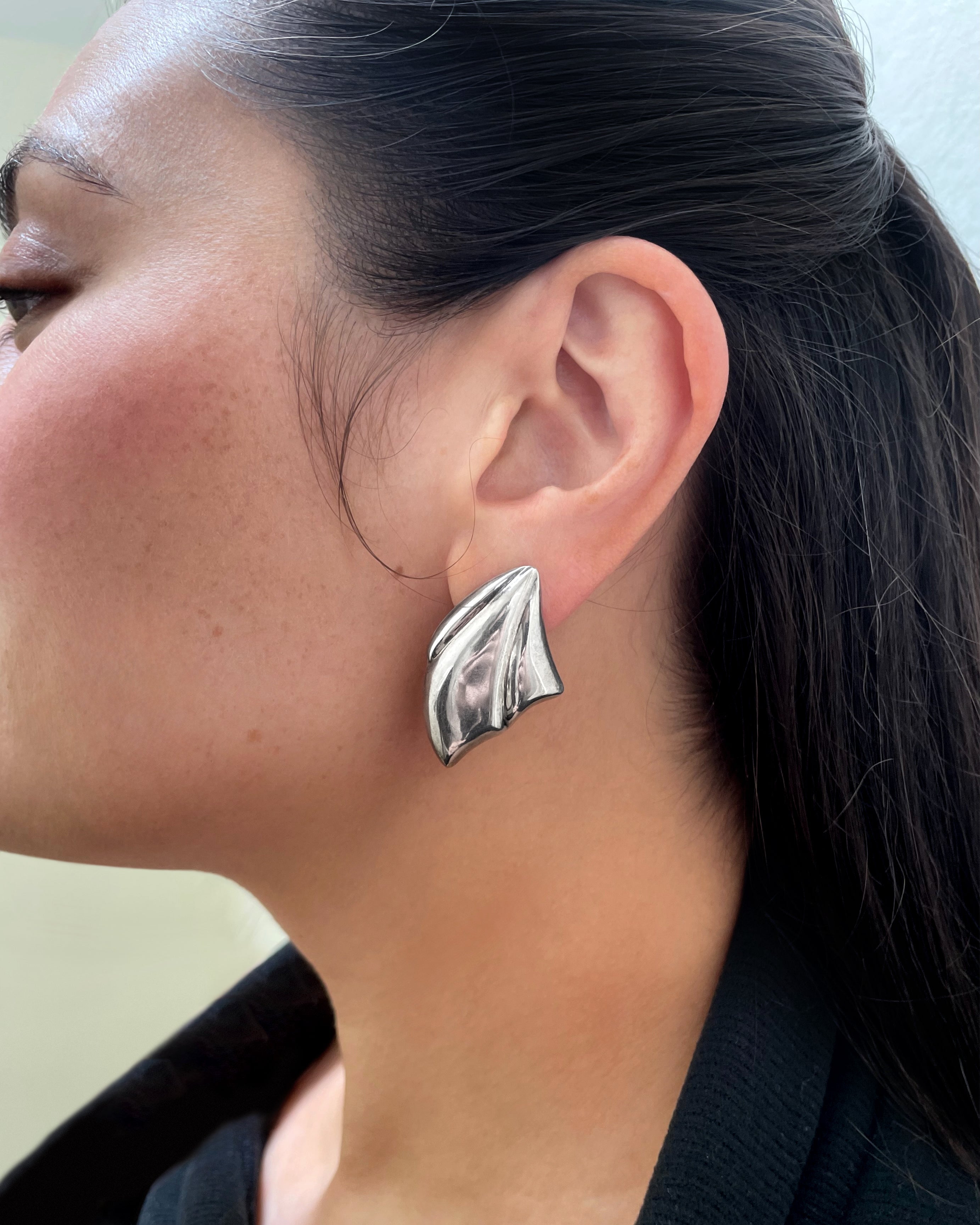 Postmodern era sculptural earrings