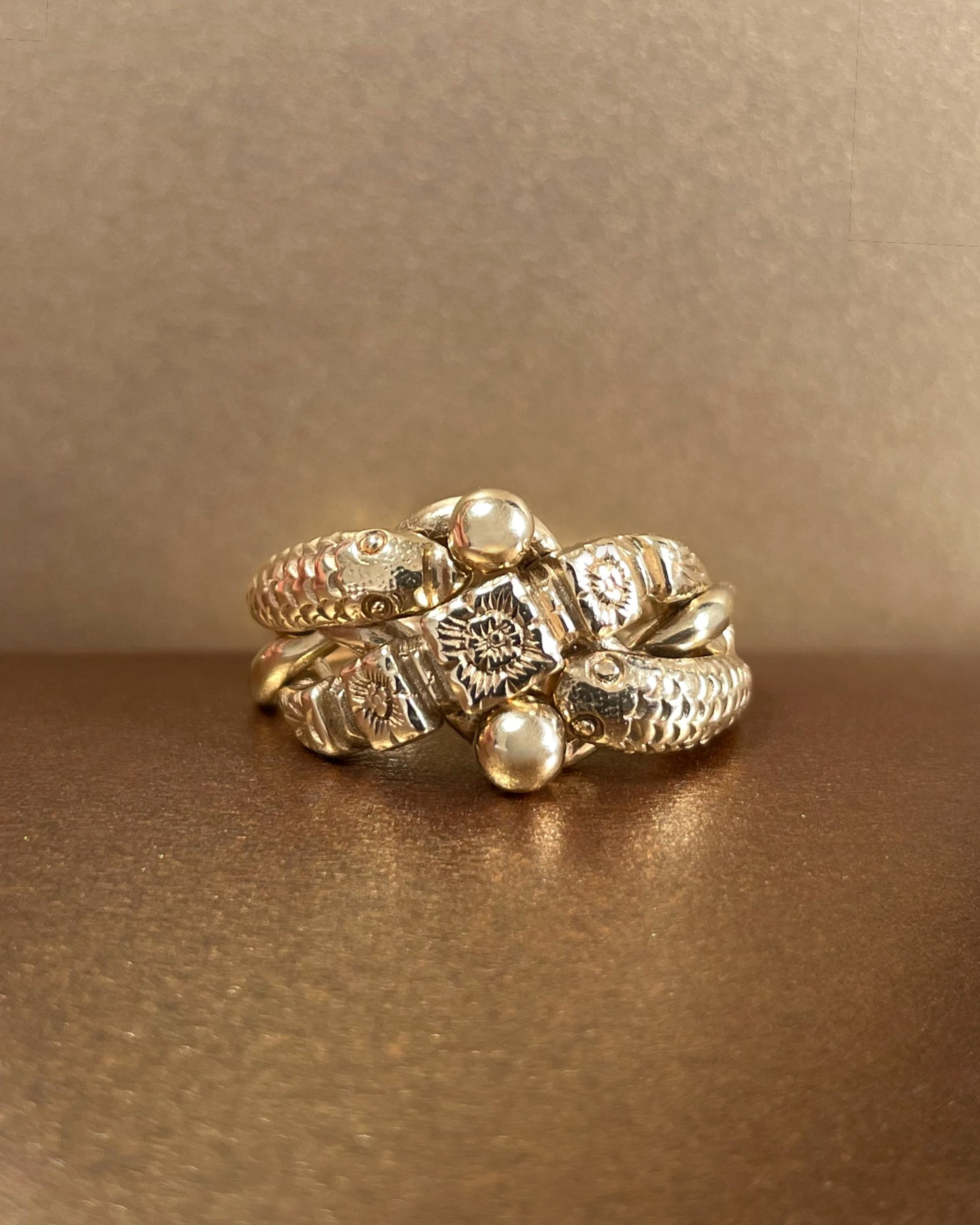 Vintage British flower and serpent puzzle ring in 9kt yellow gold, front view – Auric Vintage