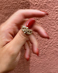 Vintage British flower and serpent puzzle ring in 9kt yellow gold worn on hand – Auric Vintage