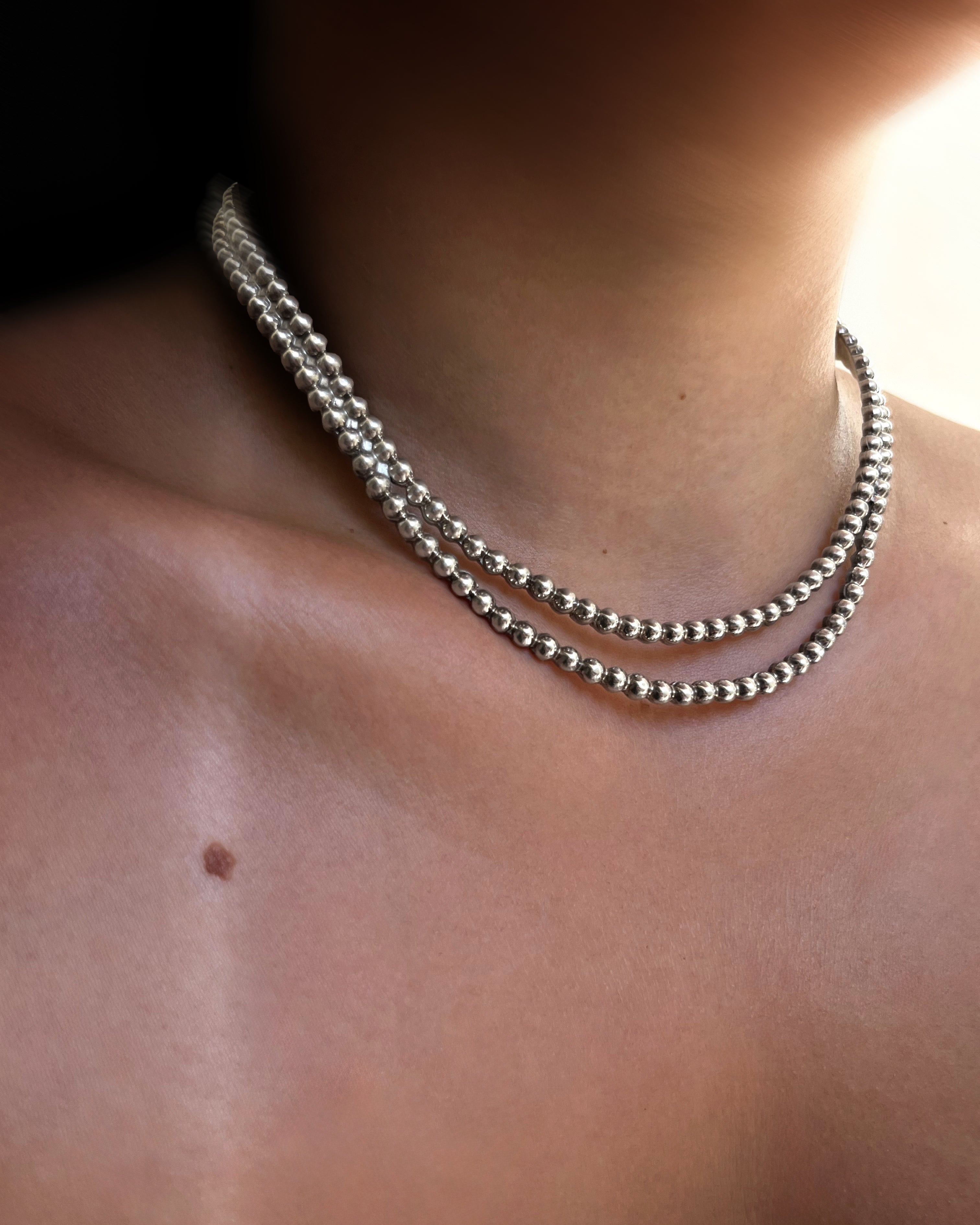 Y2K bubble torque collar in Sterling silver worn on the neck – Auric Vintage