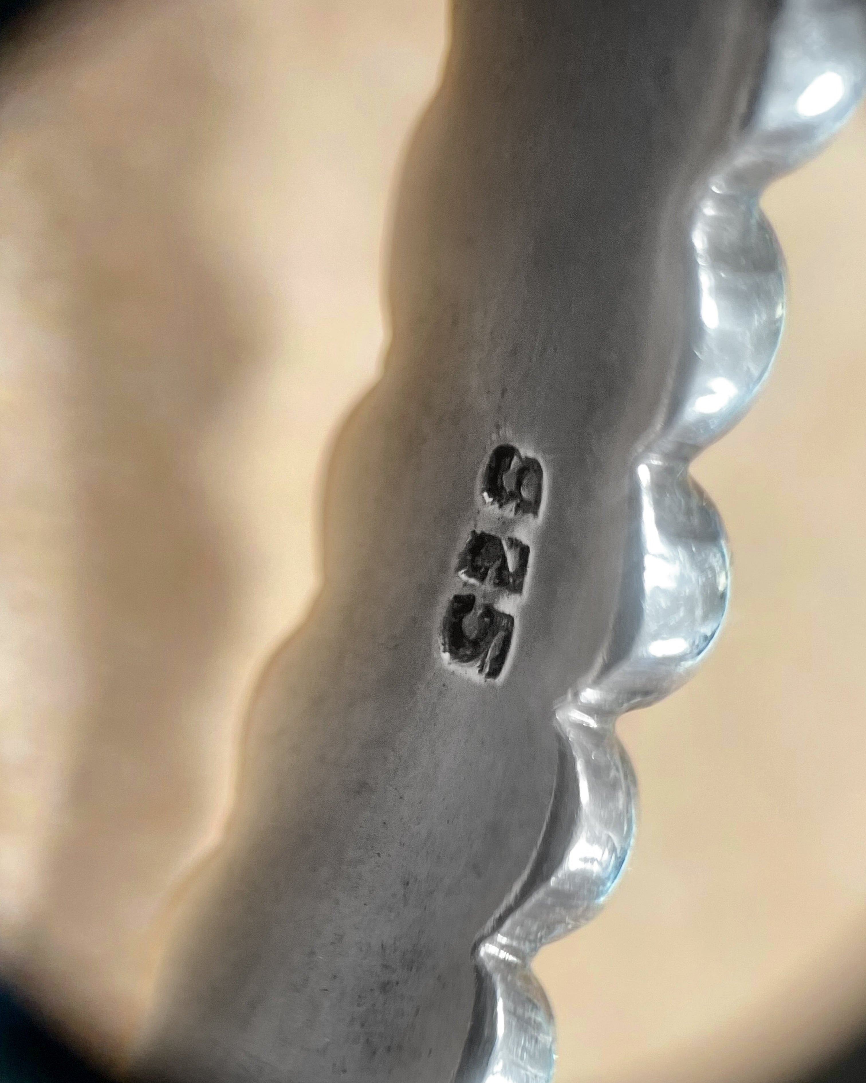 Close-up of 925 mark on Y2K Sterling silver bubble torque collar – Auric Vintage