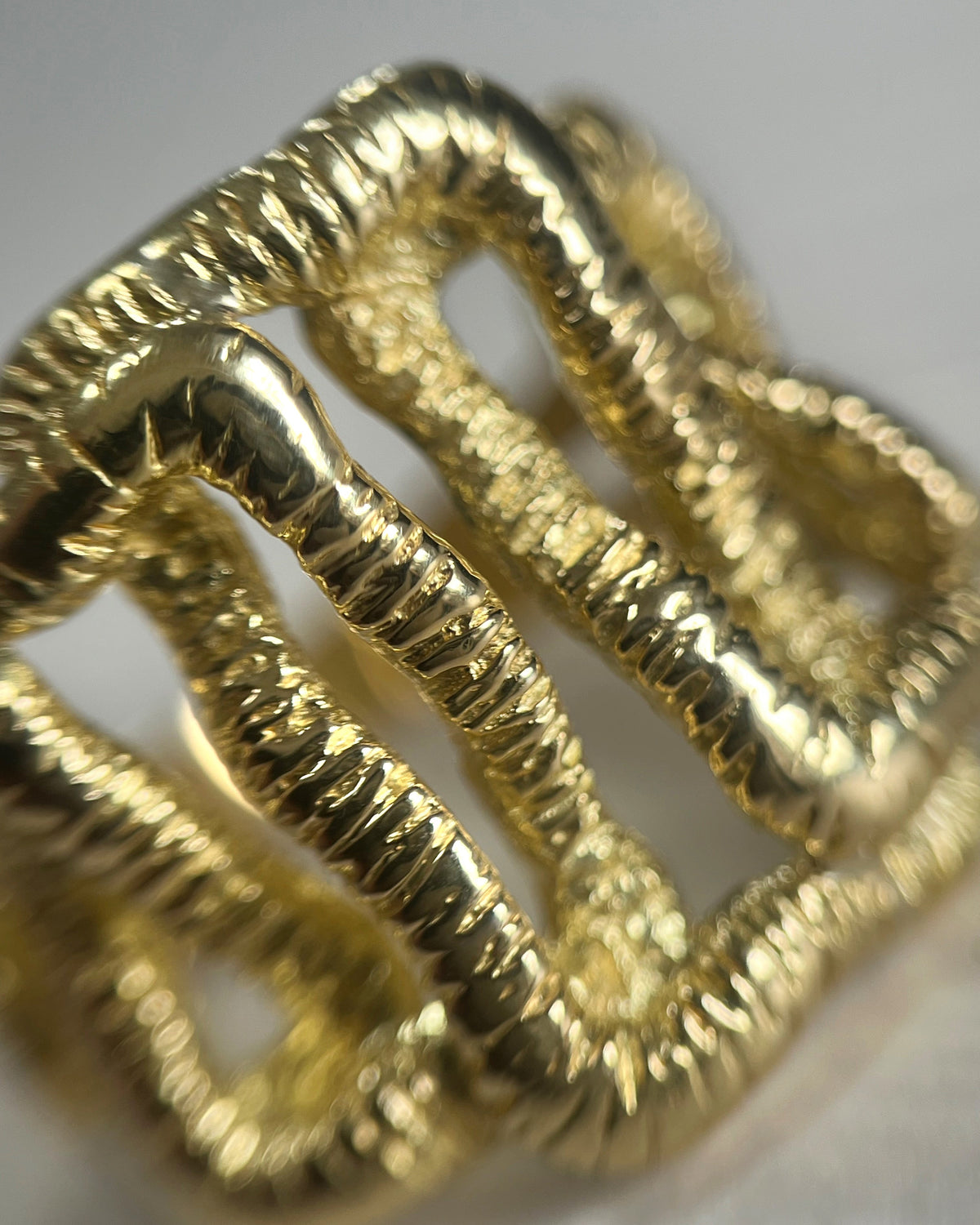 Nineties textured openwork cubist ring
