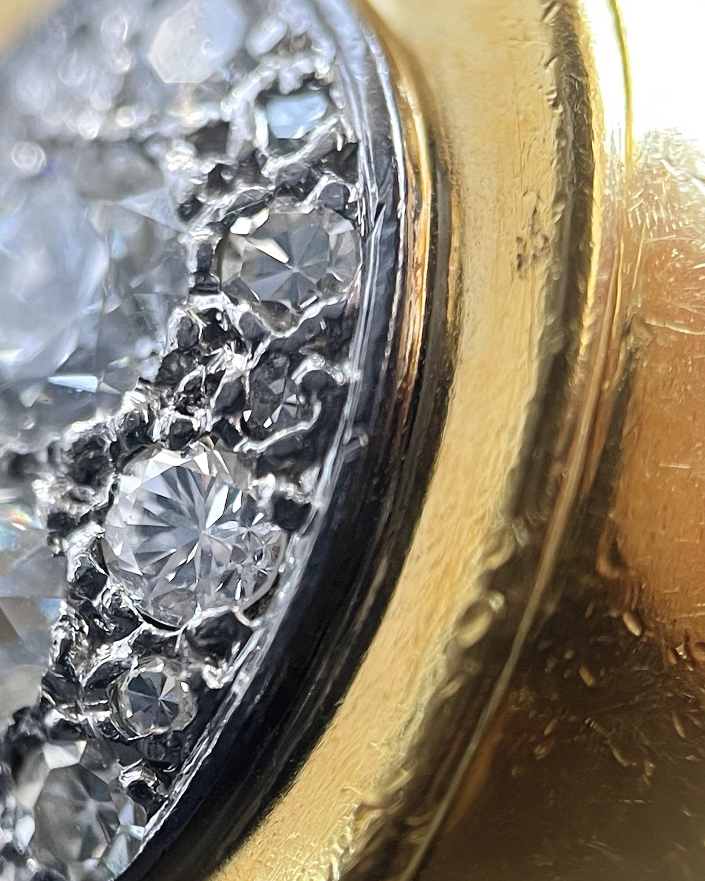 Close-up of retro diamond cluster ring showing mixed cut diamonds and grain settings – Auric Vintage