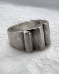 Side view of sculptural brutalist quad-rib ring in solid silver showing bold architectural form and depth – Auric Vintage