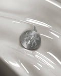 Vintage engine-turned Gemini pendant