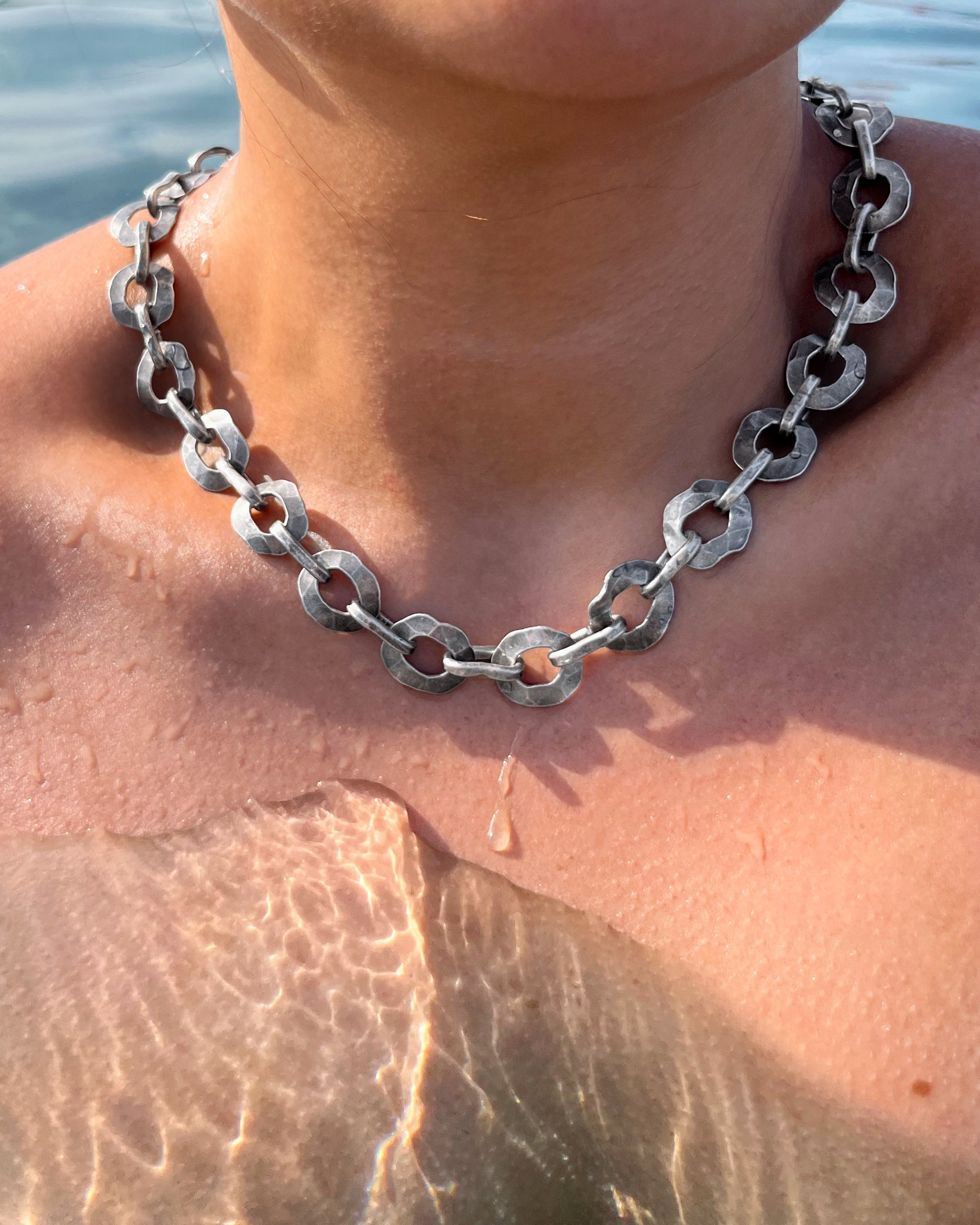 Brutalist hammered oval necklace