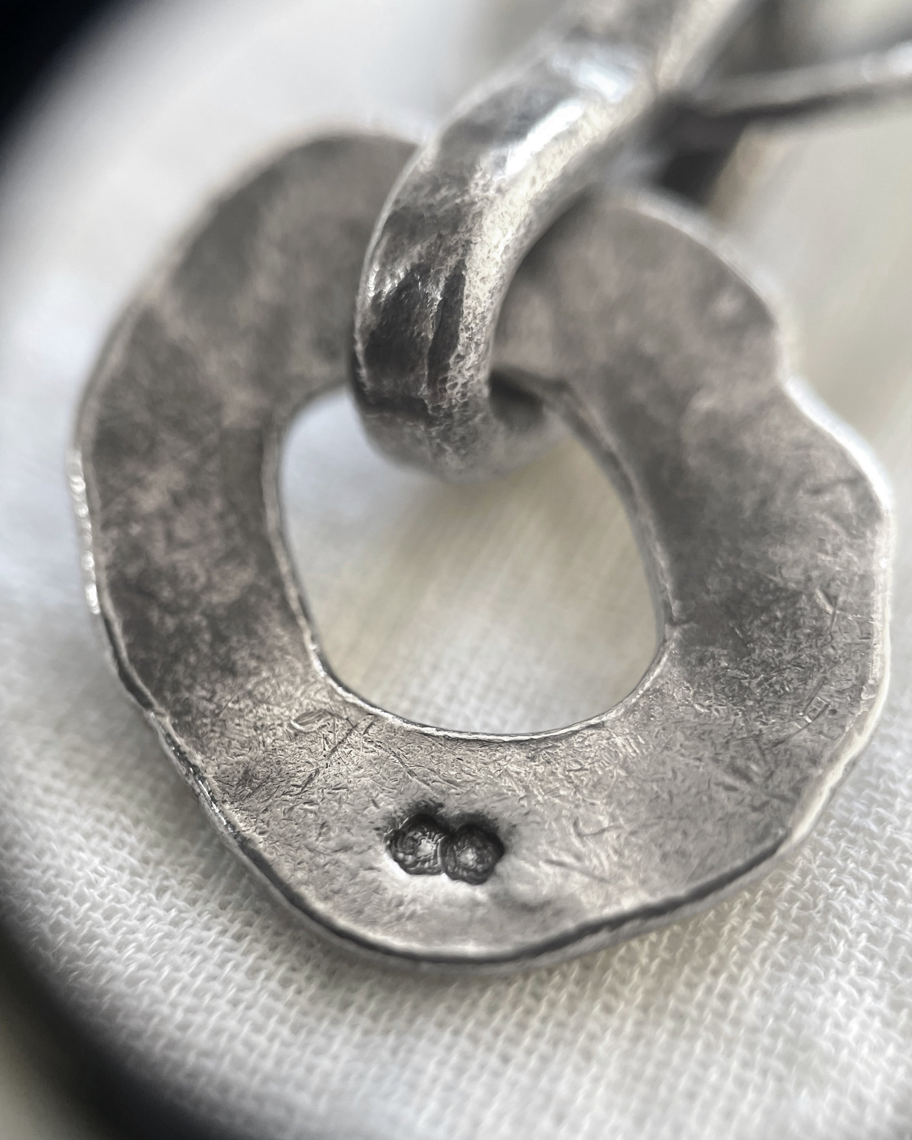 Brutalist hammered oval link bracelet