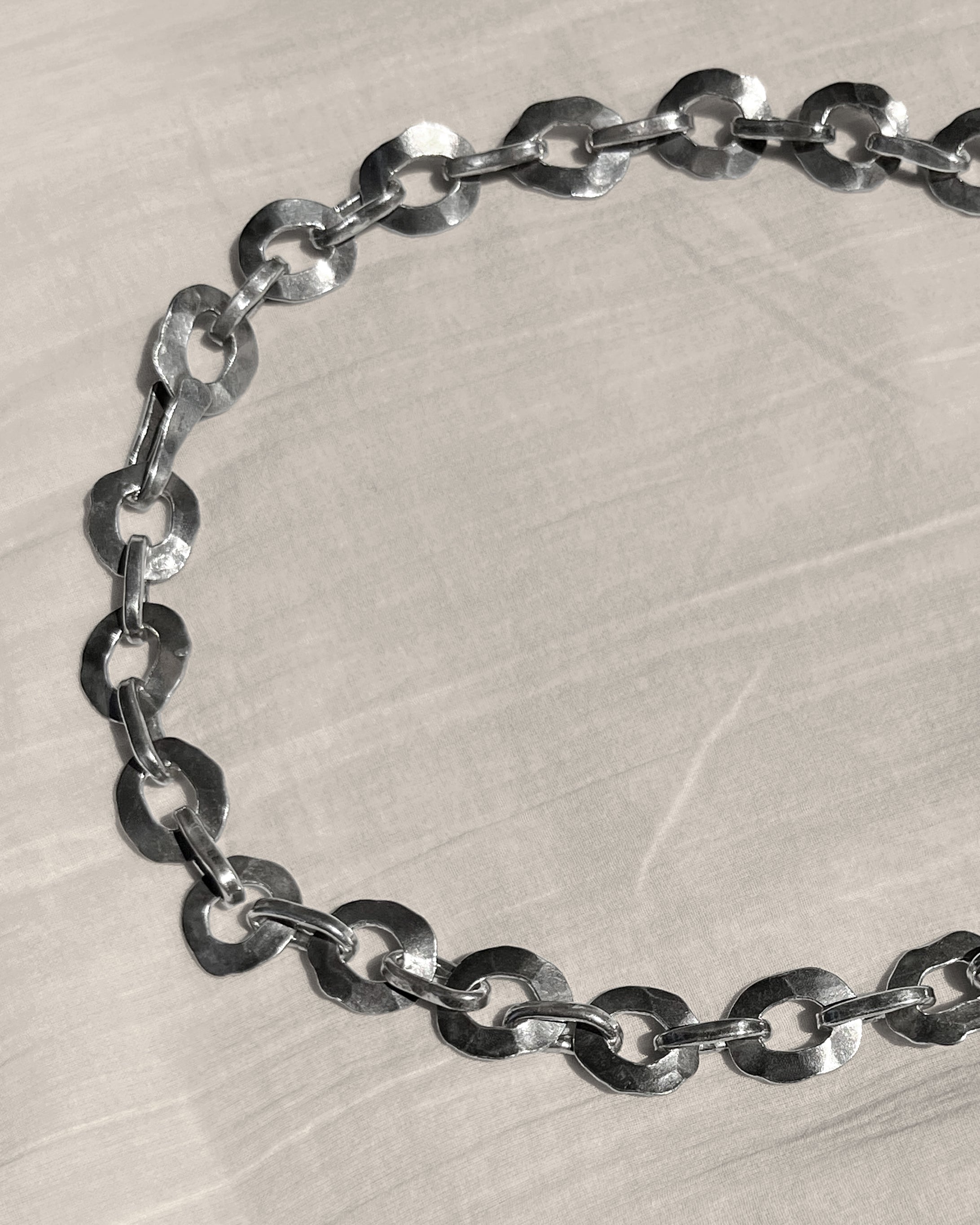 Brutalist hammered oval necklace