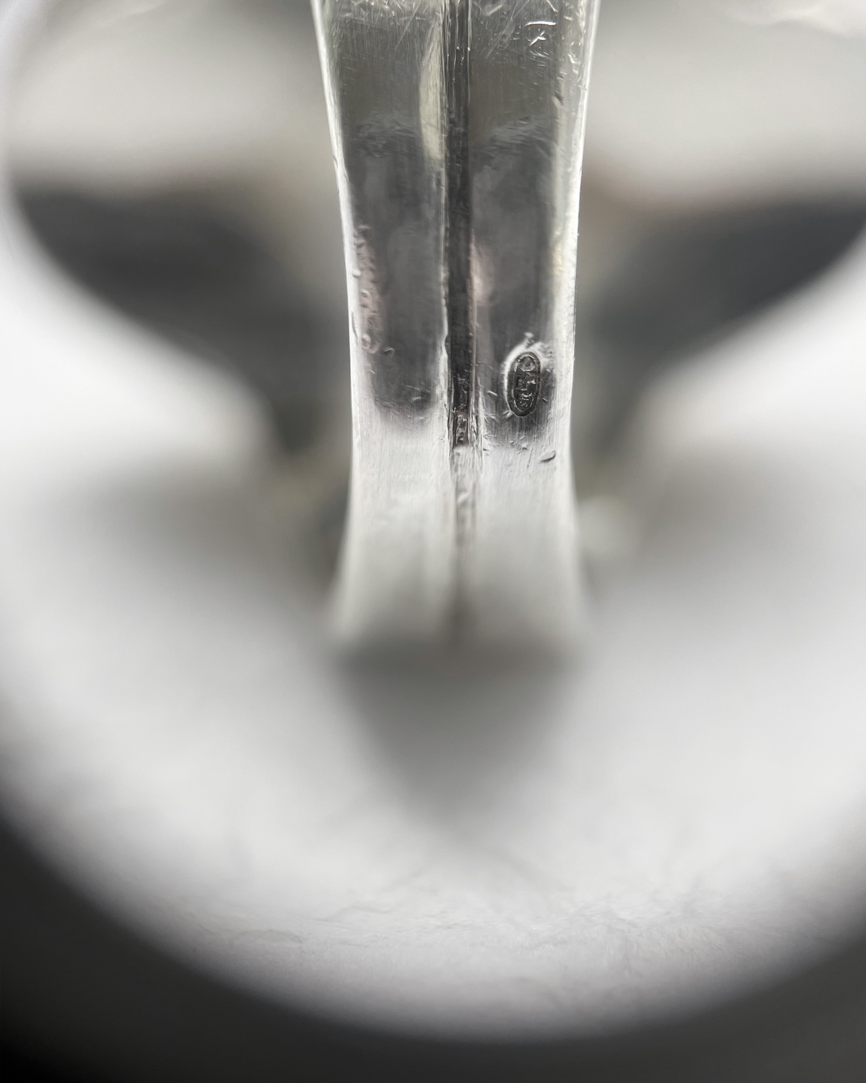 Close-up of vintage sterling silver domed ring showing French maker’s mark and silver hallmark on shank – Auric Vintage