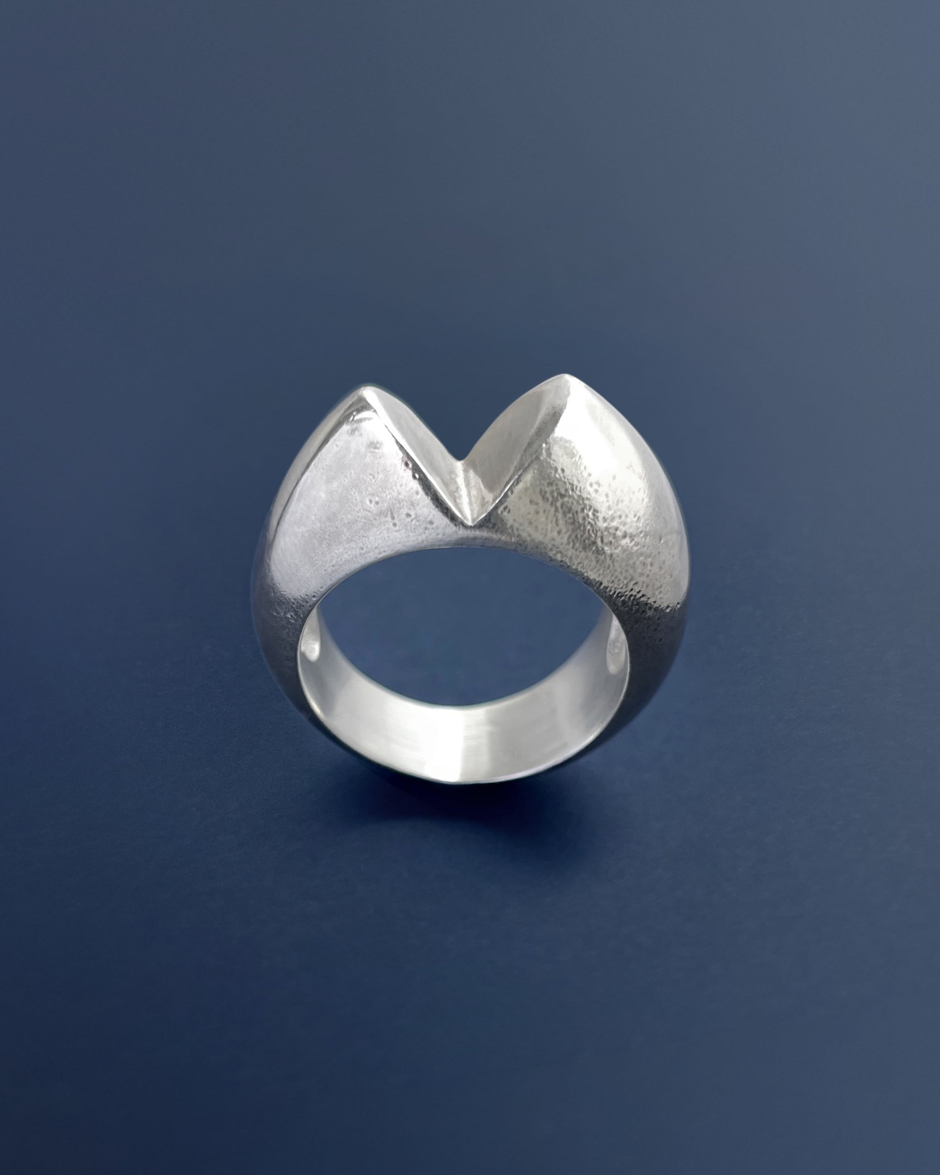 Side view of French modernist heart ring in sterling silver showing chunky tapering band and sculptural profile – Auric Vintage
