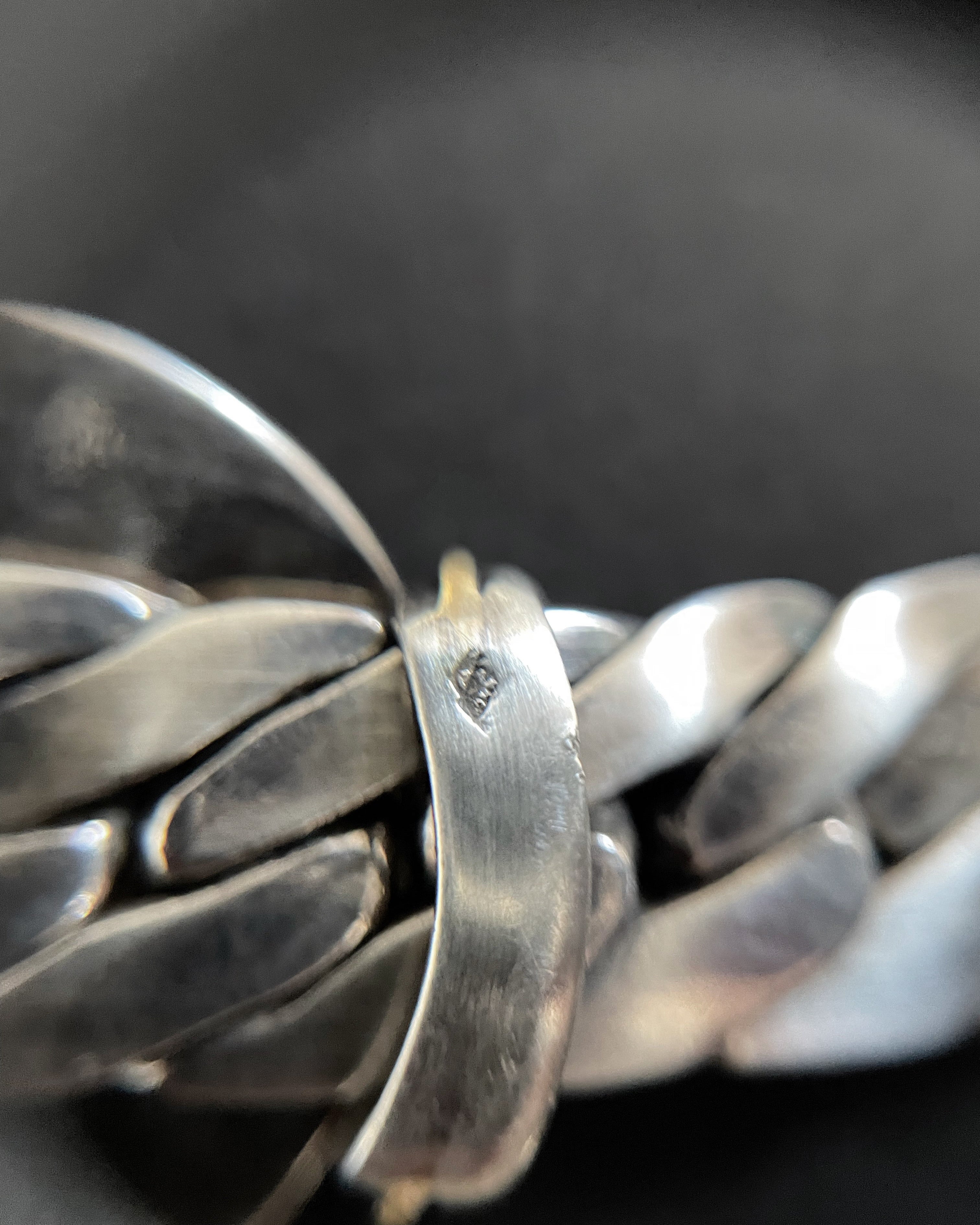 Close-up of vintage Arthus Bertrand sterling silver tetradrachm pendant necklace showing maker’s mark on terminal – Auric Vintage