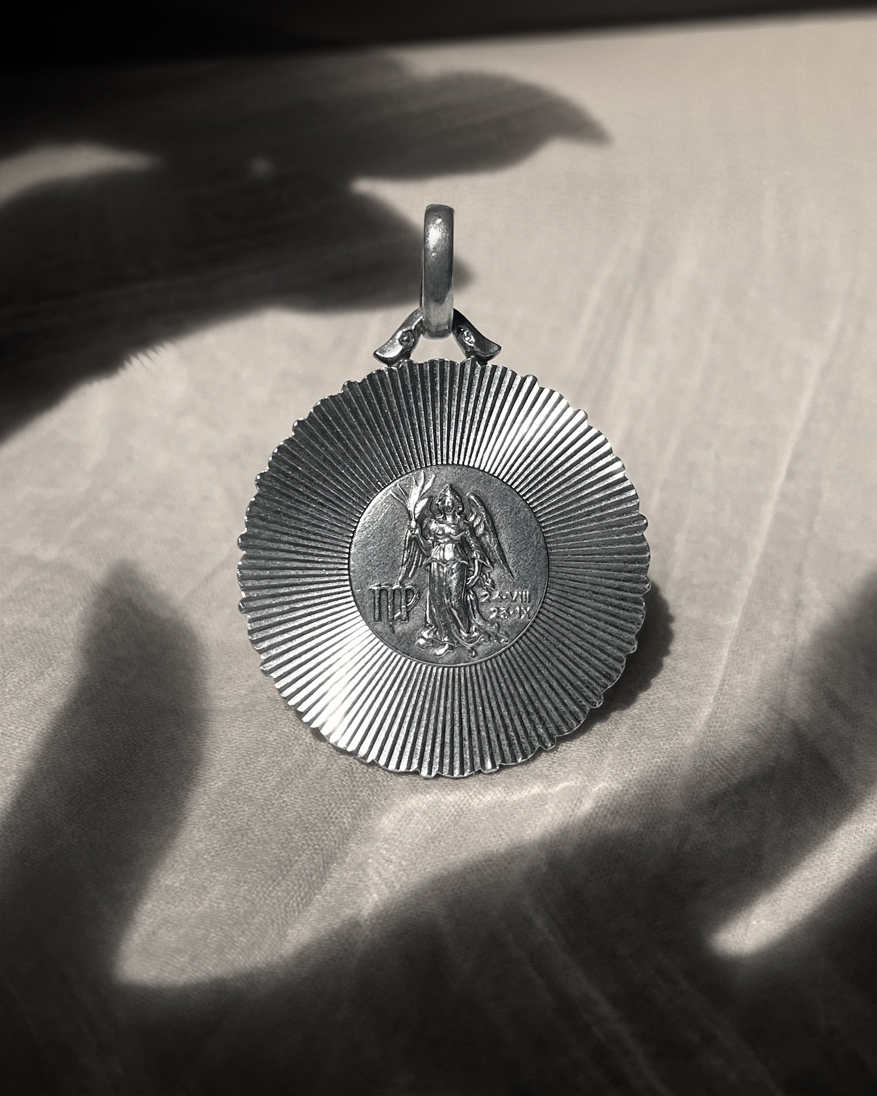 Mid century engine turned Virgo pendant