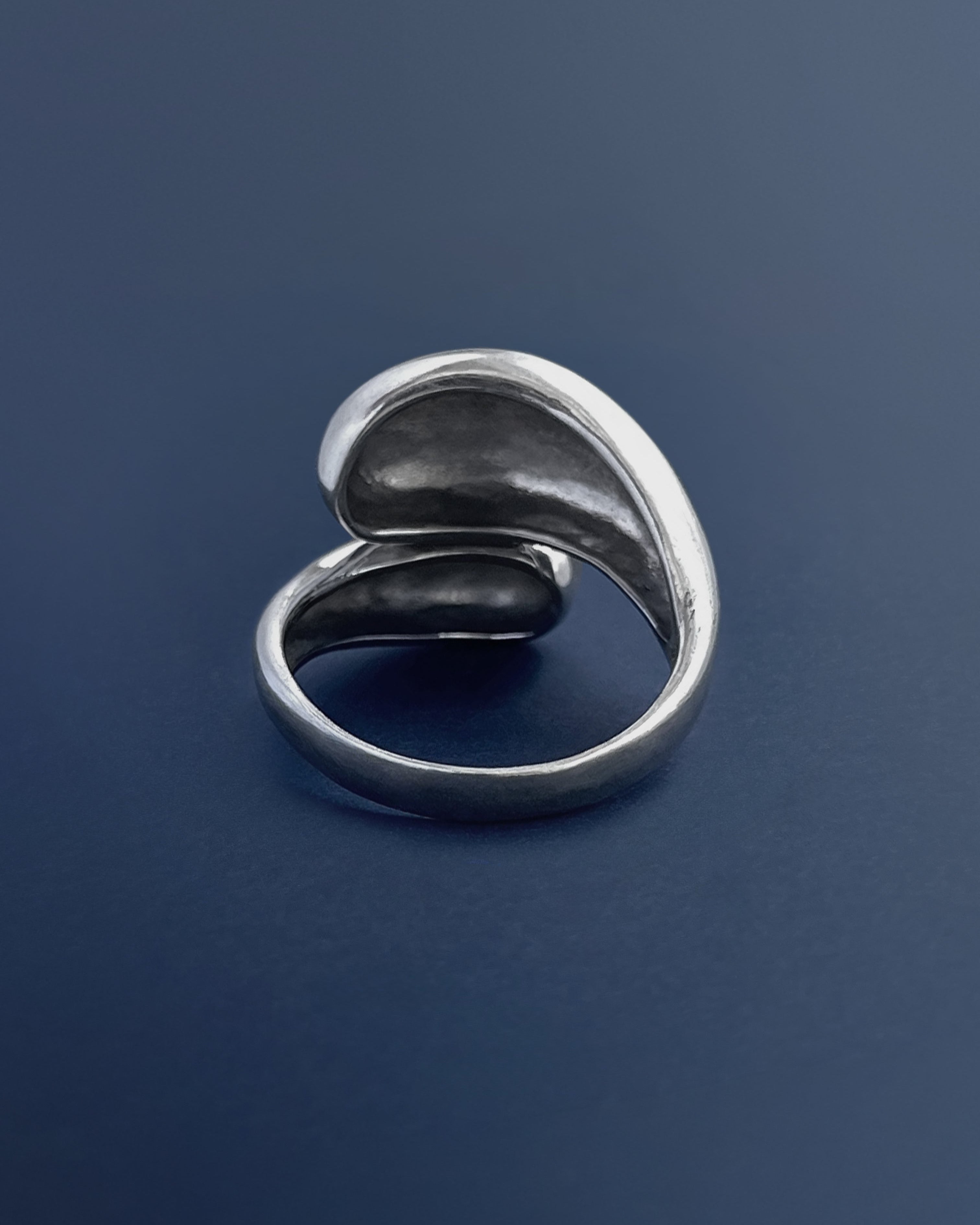 Reverse of Y2K bypass ring in sterling silver showing polished shank and open sculptural design – Auric Vintage
