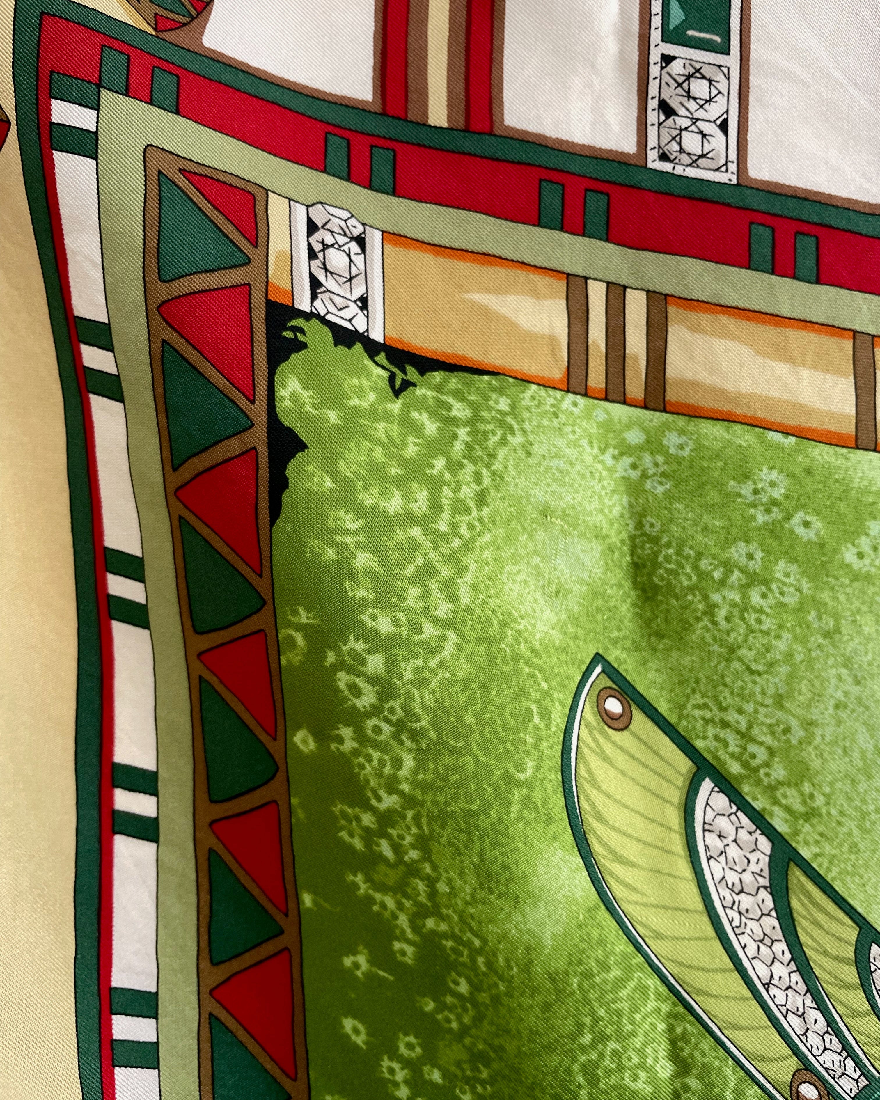 Close-up of hand-rolled edge on vintage light green Must de Cartier Le Scarabée silk scarf – Auric Vintage
