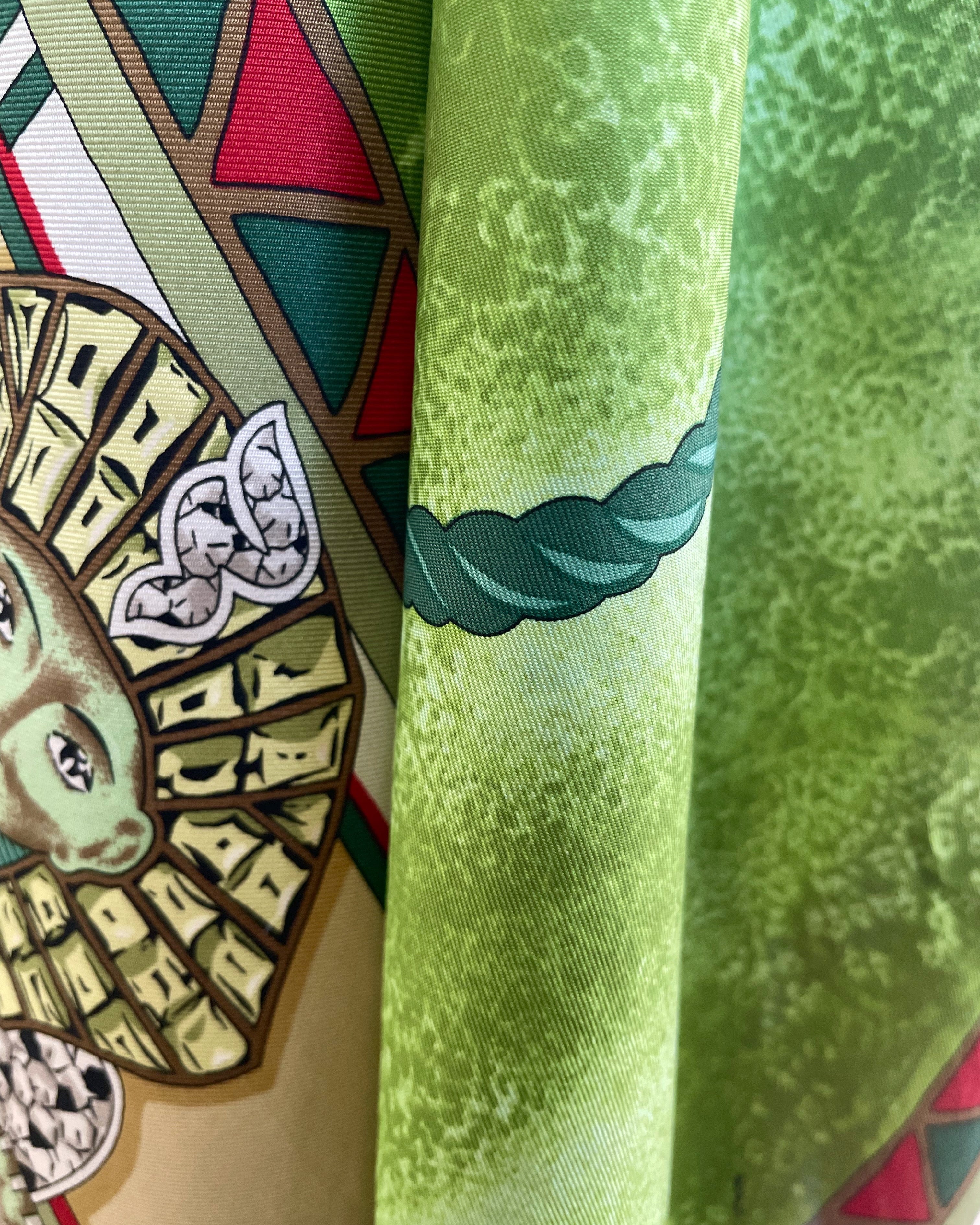 Vintage light green Must de Cartier Le Scarabée silk scarf gathered to highlight drape and silk texture – Auric Vintage