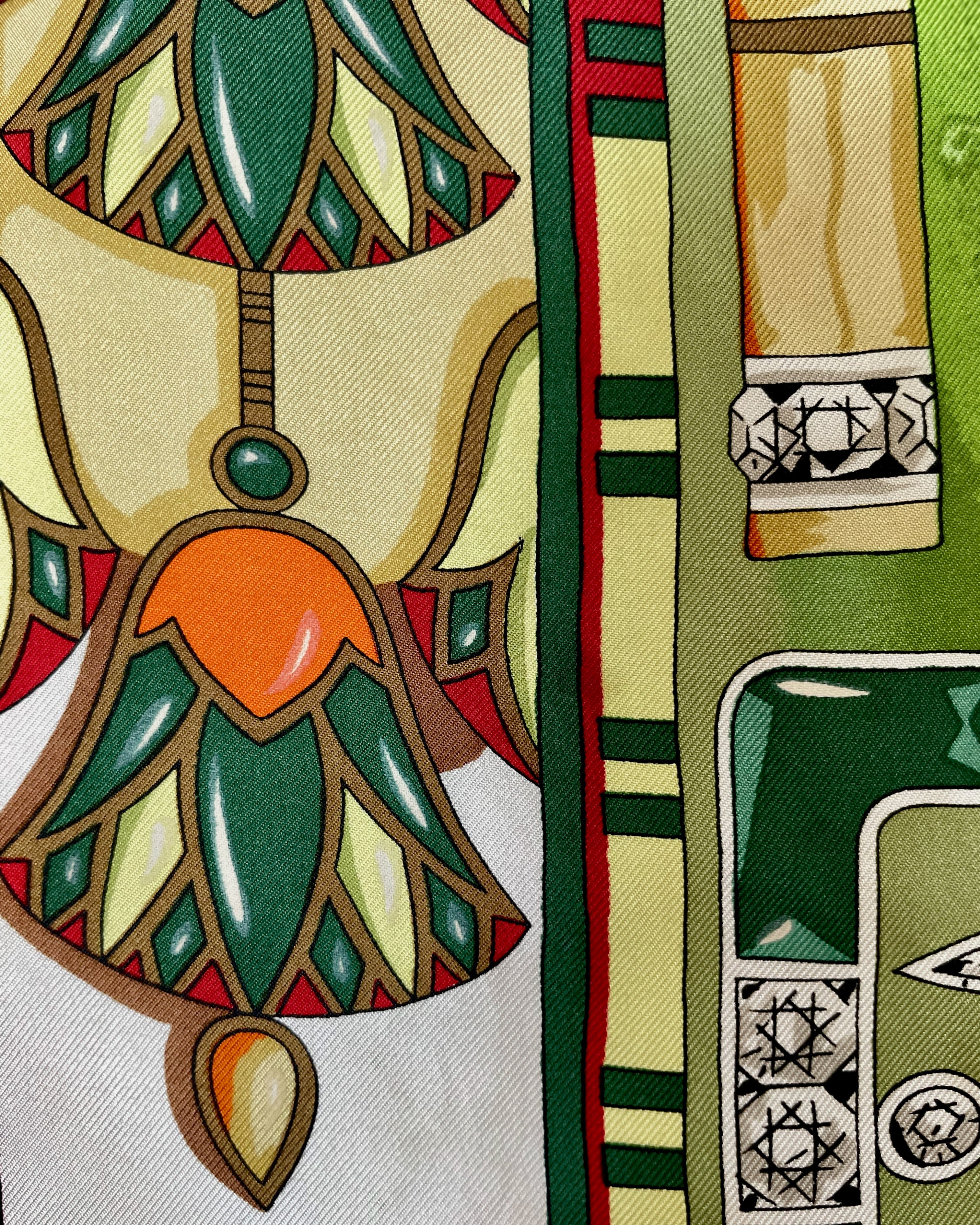 Close-up of lotus flower border on vintage light green Must de Cartier Le Scarabée silk scarf – Auric Vintage
