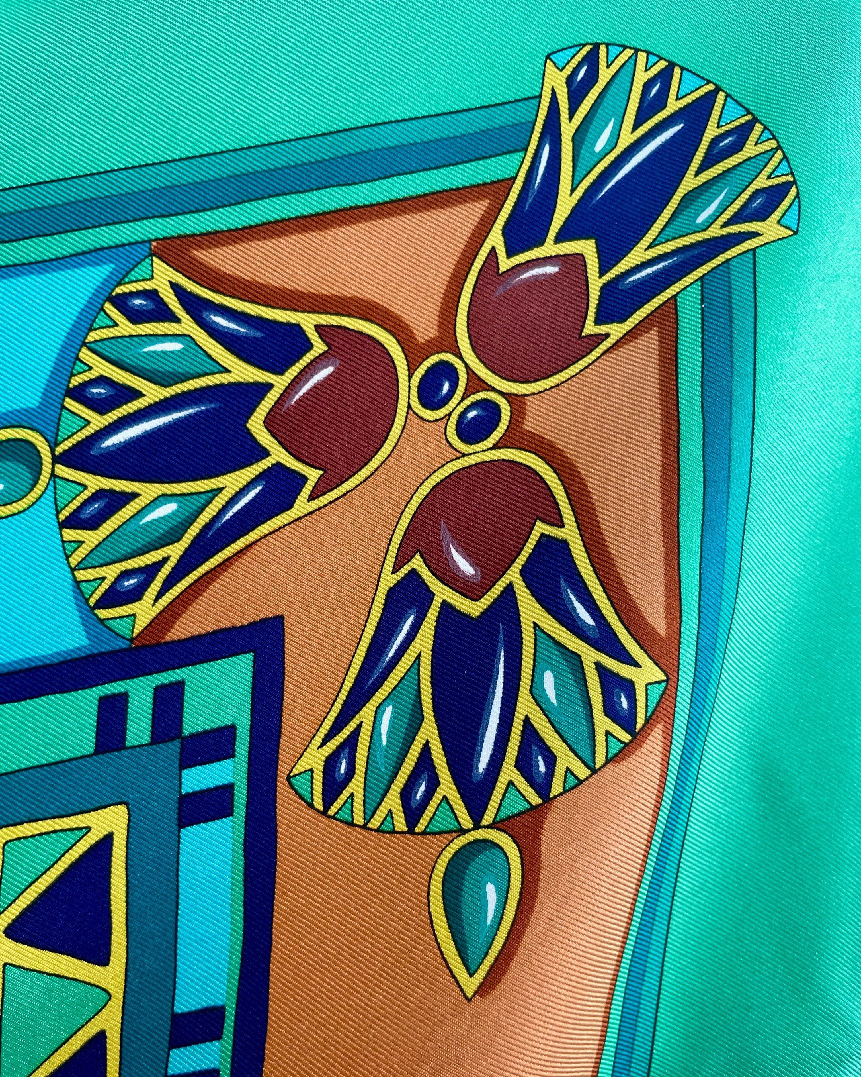 Close-up of lotus flower border on vintage dark green Must de Cartier Le Scarabée silk scarf – Auric Vintage