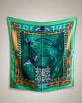 Vintage Must de Cartier Le Scarabée silk scarf in dark green featuring Egyptomania-inspired design, hanging display – Auric Vintage