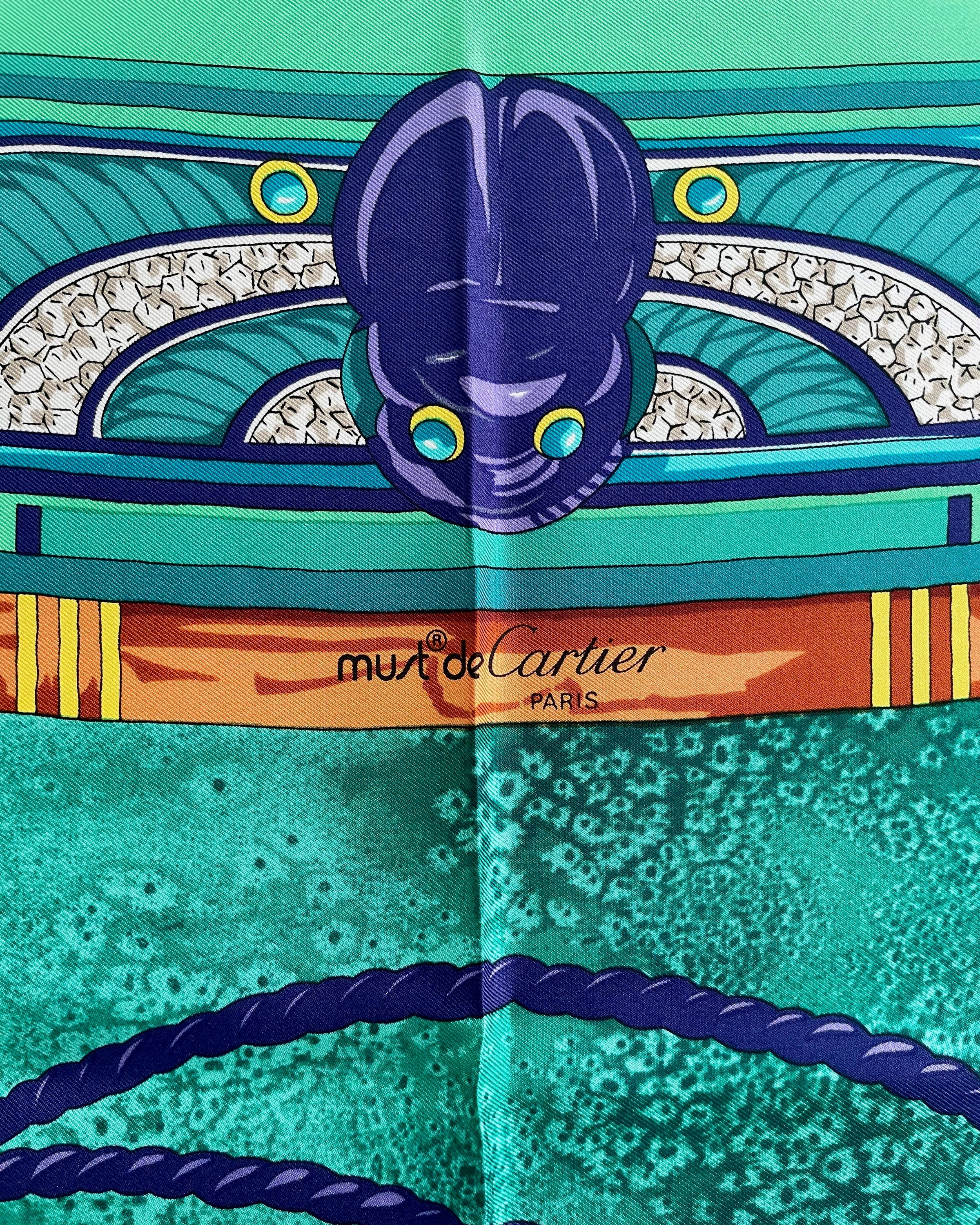 Must de Cartier Le Scarabée scarf in dark green
