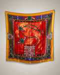 Vintage Must de Cartier Le Scarabée silk scarf in red featuring Egyptomania-inspired design, hanging display – Auric Vintage