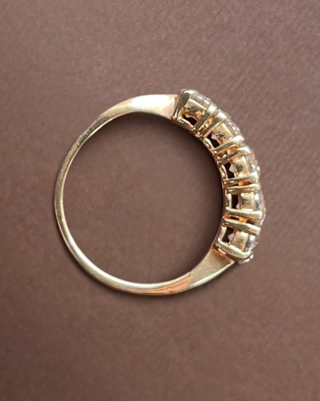 Bird’s-eye view of noughties 14kt yellow gold five stone diamond ring showing row of brilliant cut diamonds – Auric Vintage