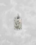 1990s French St. Christopher pendant in 18kt white gold with faceted radiating background – Auric Vintage