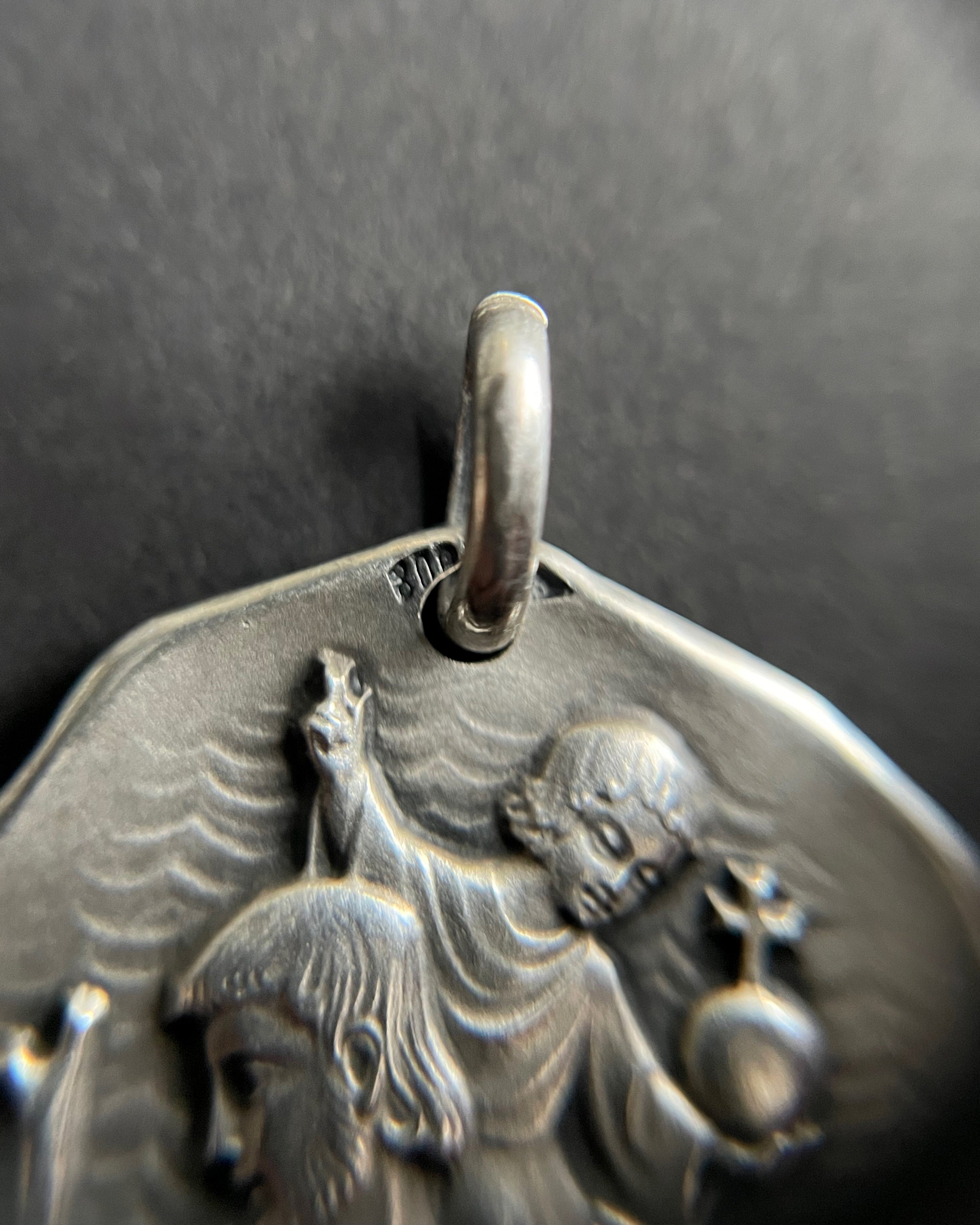 Close-up of mid century French 800 silver St. Christopher medal showing 800 silver hallmark – Auric Vintage