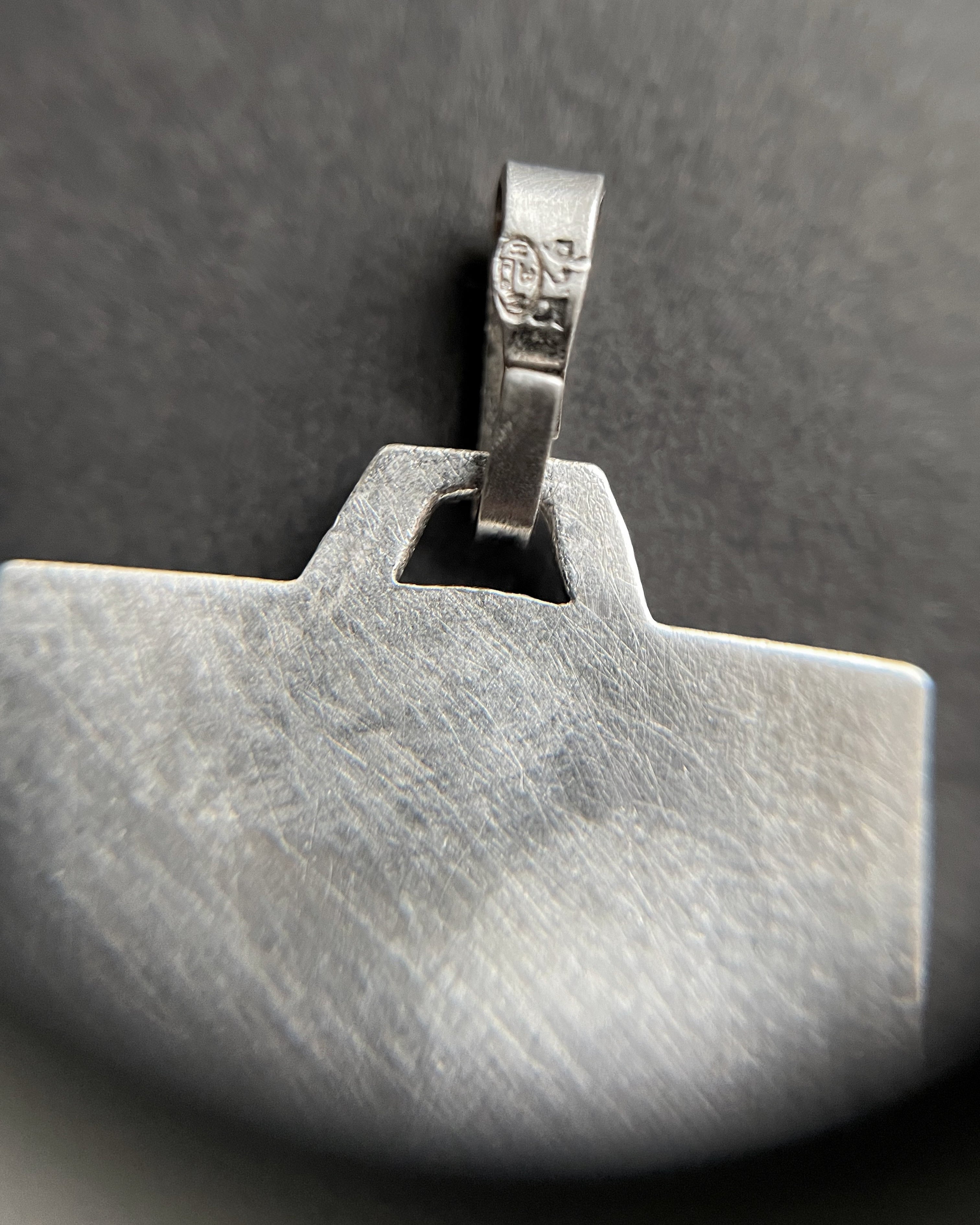 Close-up of French 800 silver St. Christopher pendant showing 925 on bale – Auric Vintage