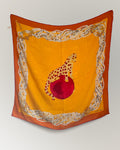 Vintage Must de Cartier silk scarf with panther motif and jewel-toned design on golden-orange ground – Auric Vintage