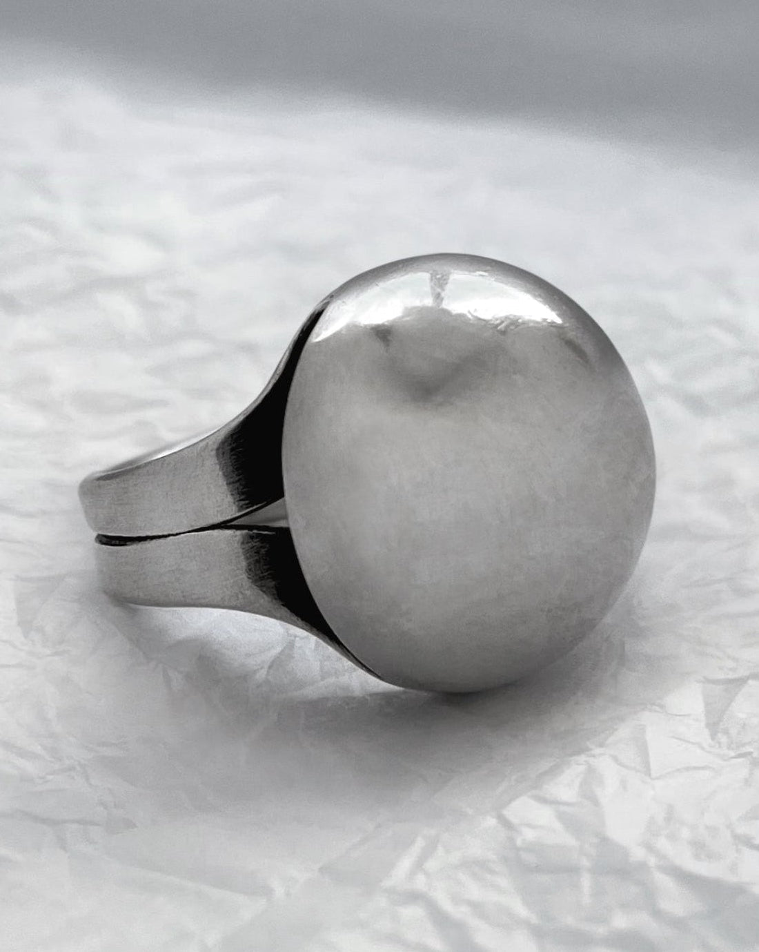 Side view of vintage domed ring in polished sterling silver showing sculptural profile and split shoulders – Auric Vintage