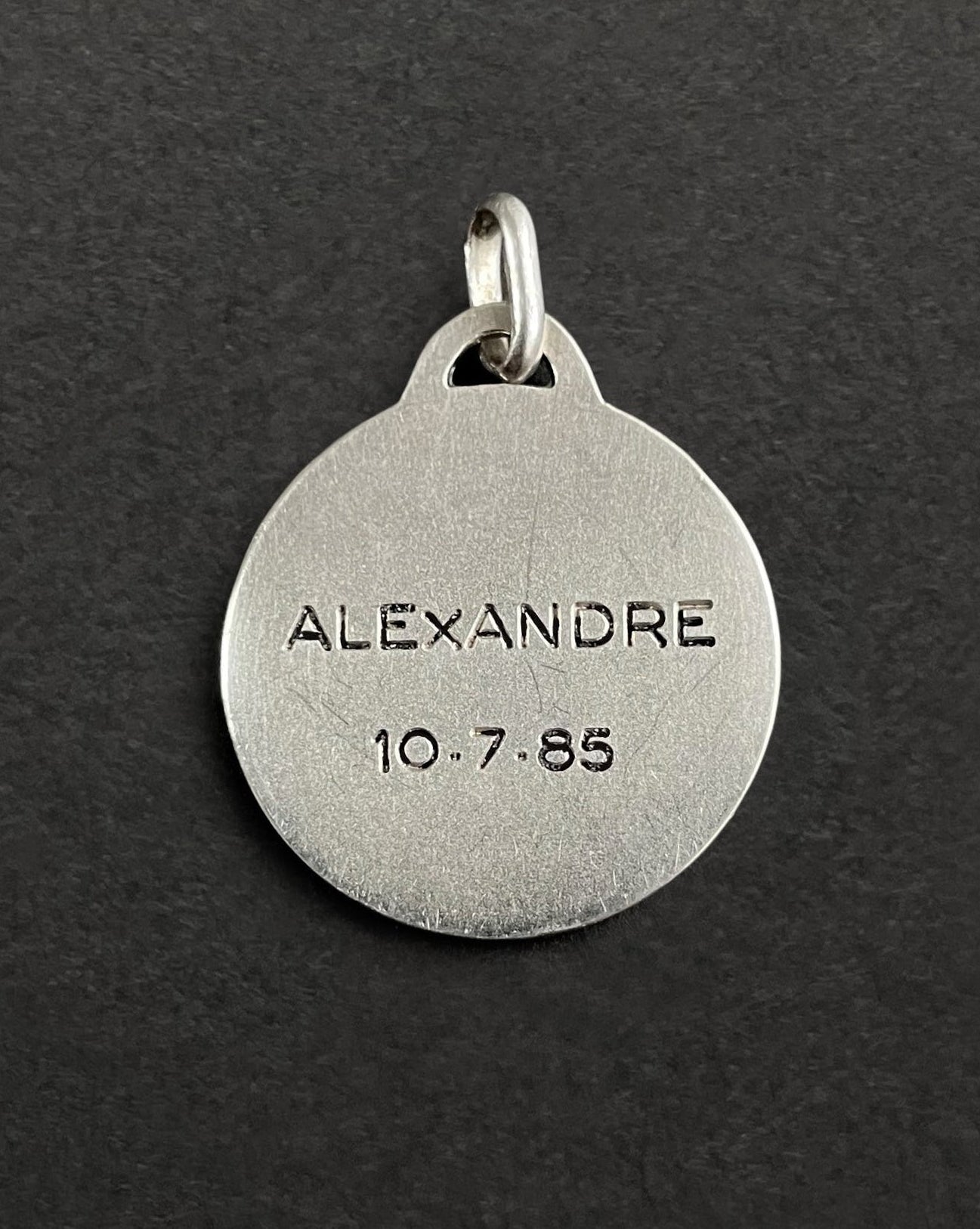 Reverse of St. Christopher medallion in silver with engraved inscription – Auric Vintage