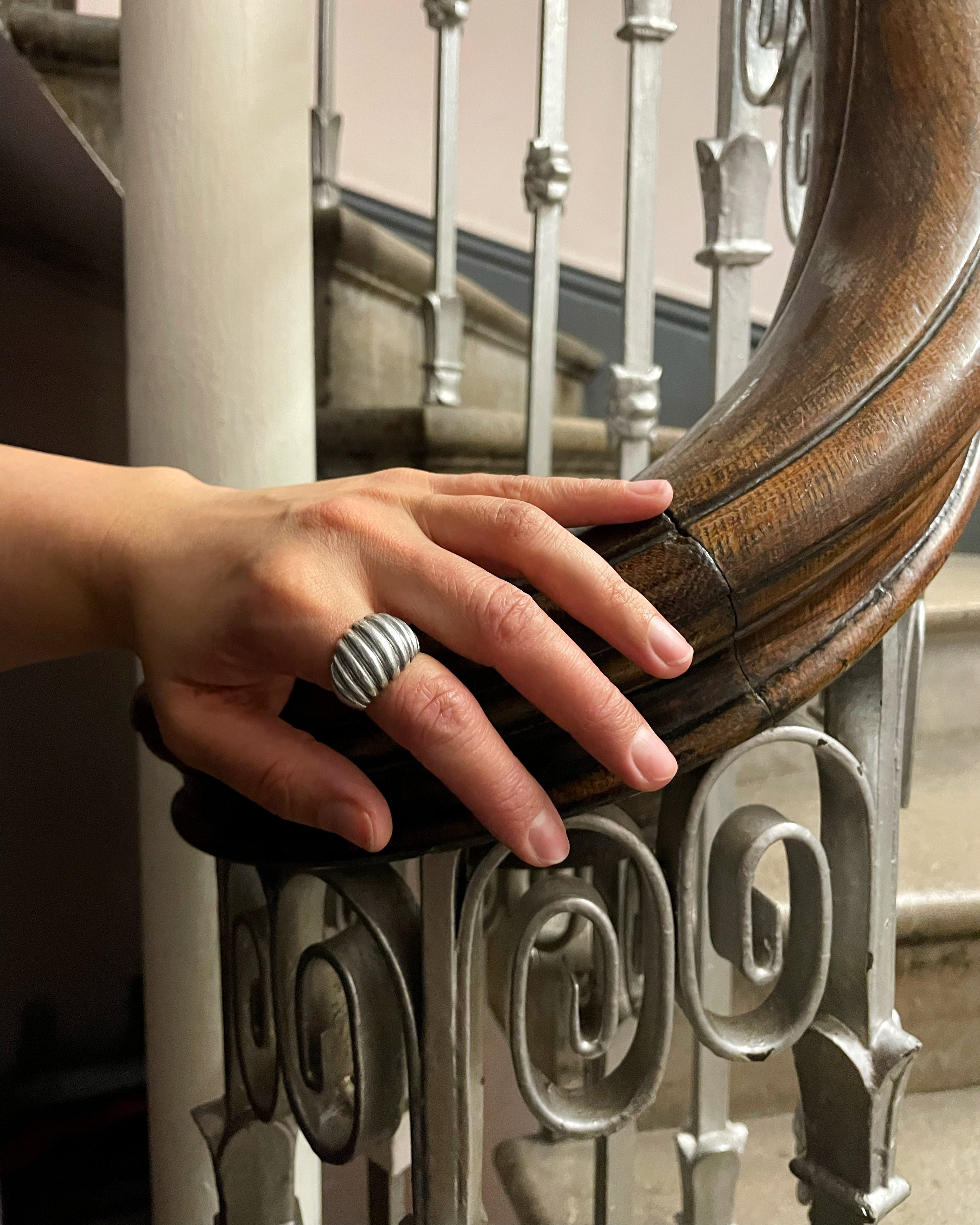 Retro ribbed bombé ring in sterling silver worn on hand showing domed shape and scale – Auric Vintage