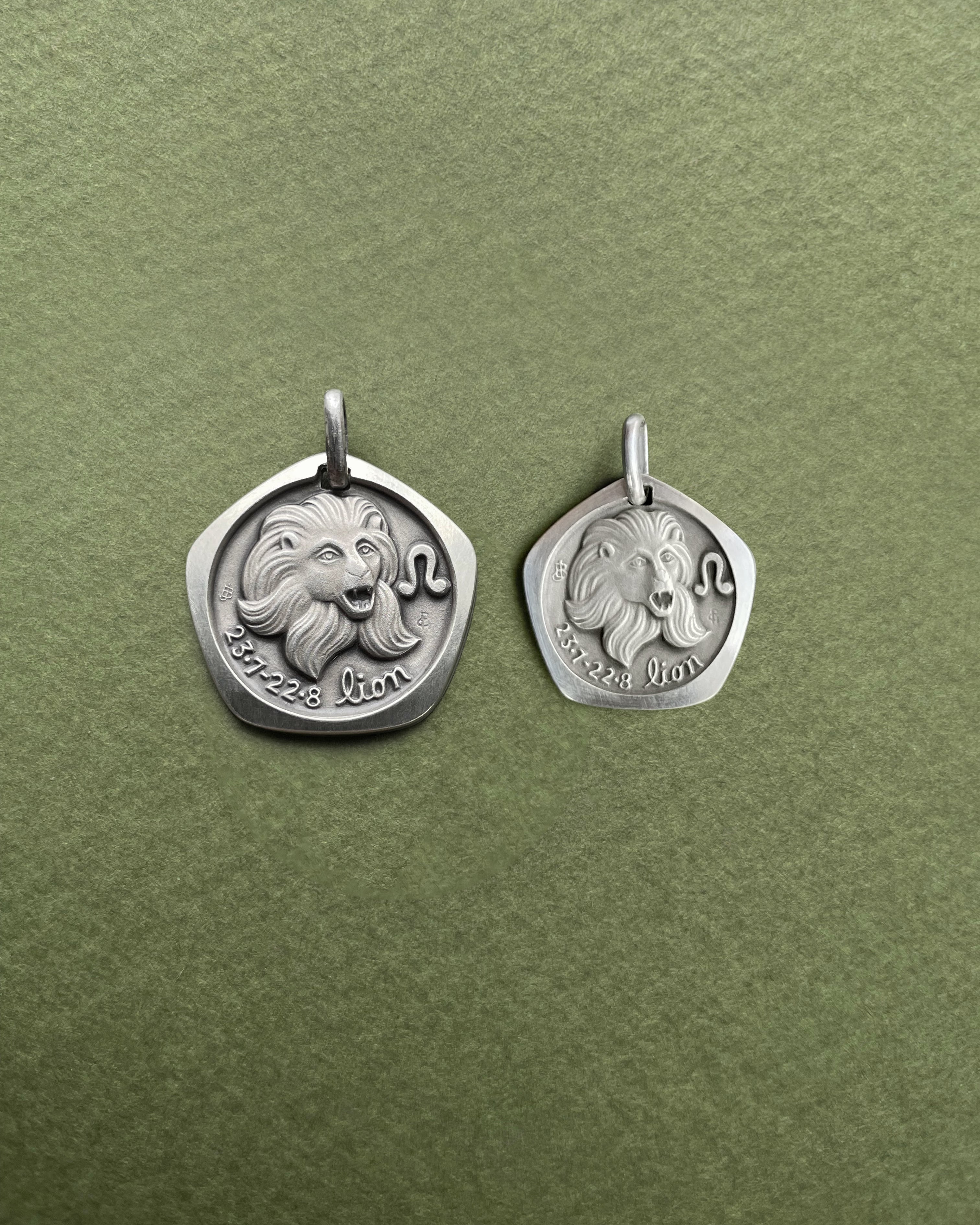 1970s French Leo zodiac mini pendant in 800 silver shown next to standard size pendant – Auric Vintage