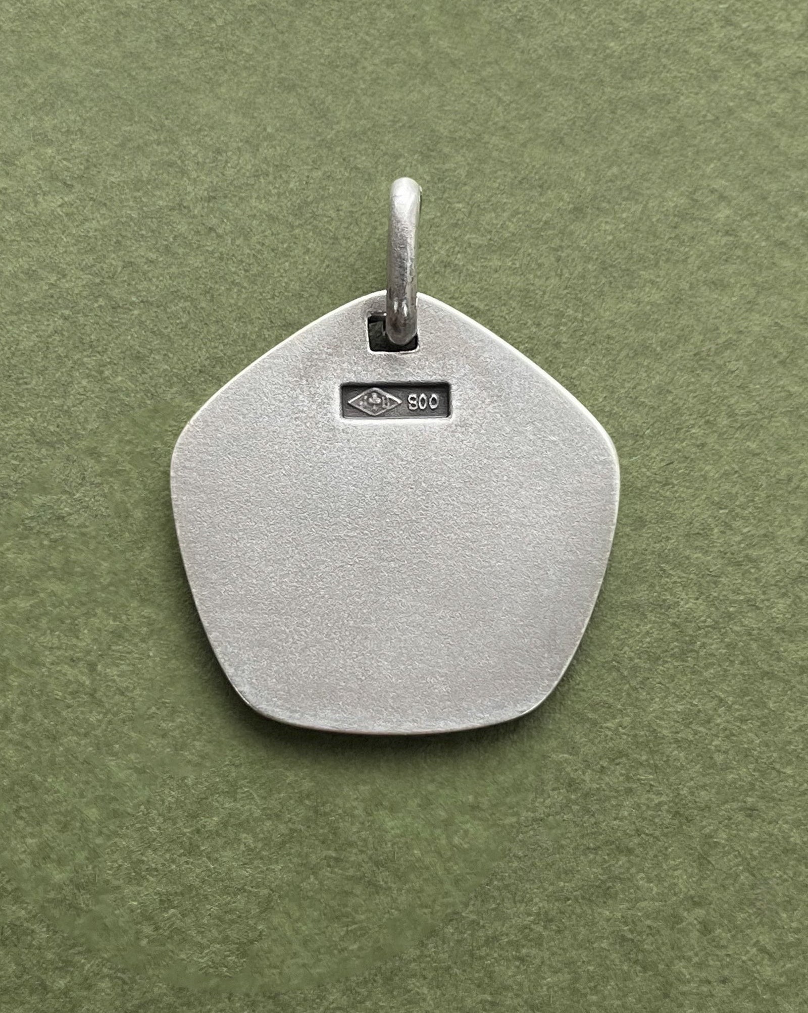 Reverse of 1970s French Libra zodiac pendant in 800 silver showing smooth finish – Auric Vintage