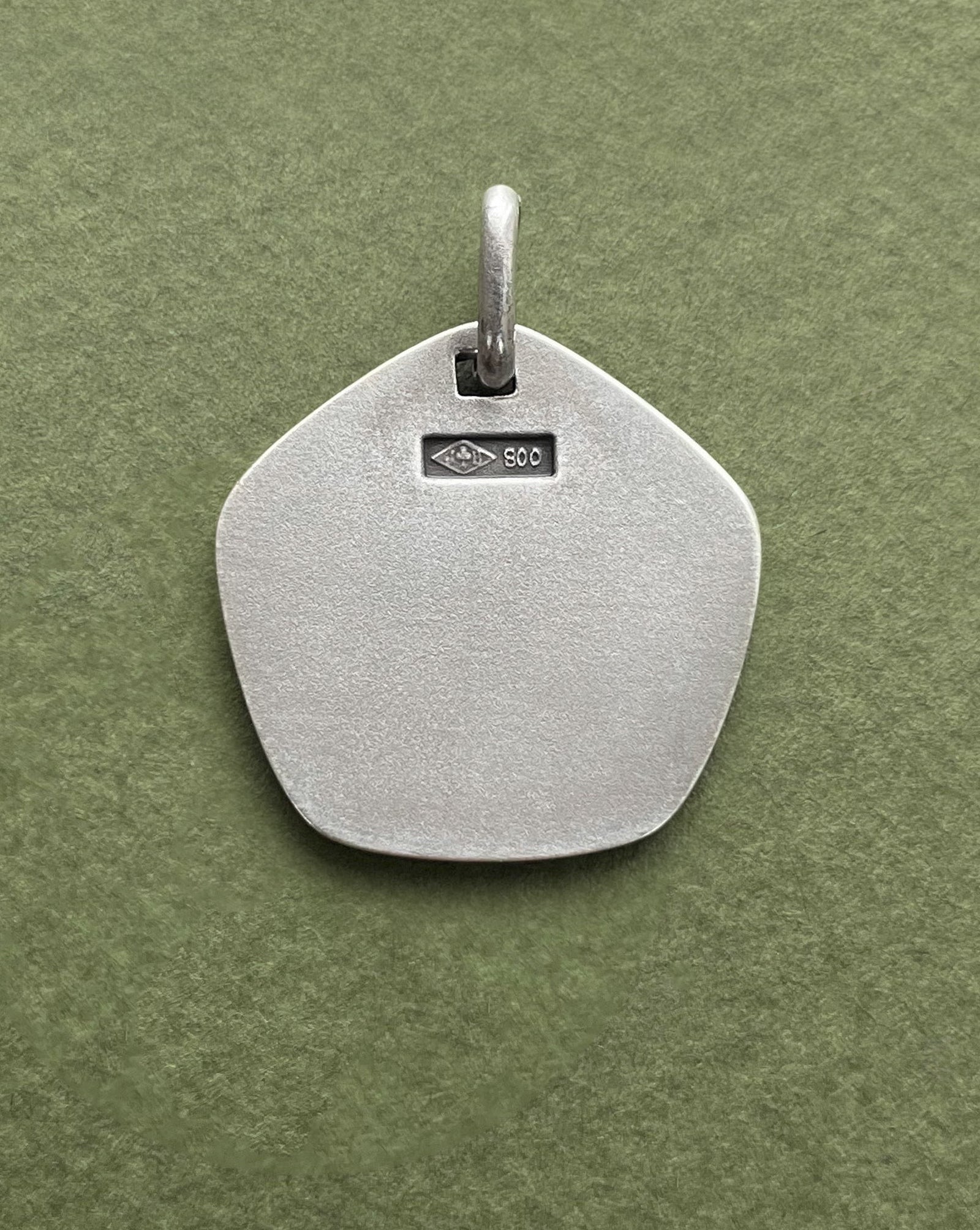 Reverse of 1970s French Pisces zodiac pendant in 800 silver showing smooth finish – Auric Vintage