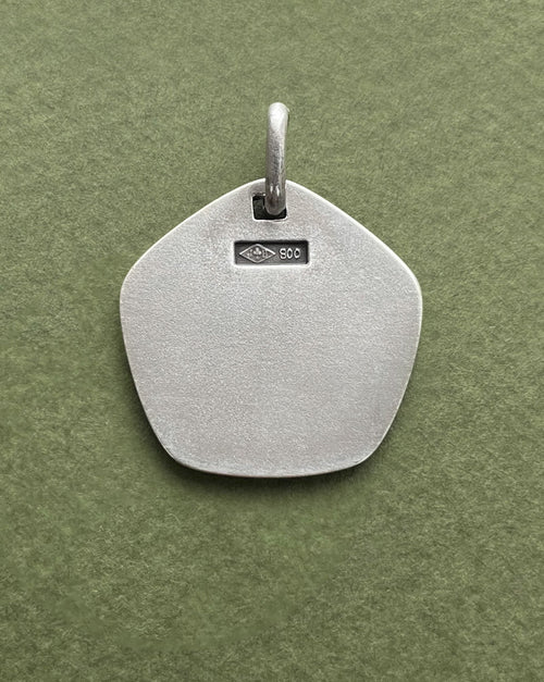 Reverse of 1970s French Pisces zodiac pendant in 800 silver showing smooth finish – Auric Vintage
