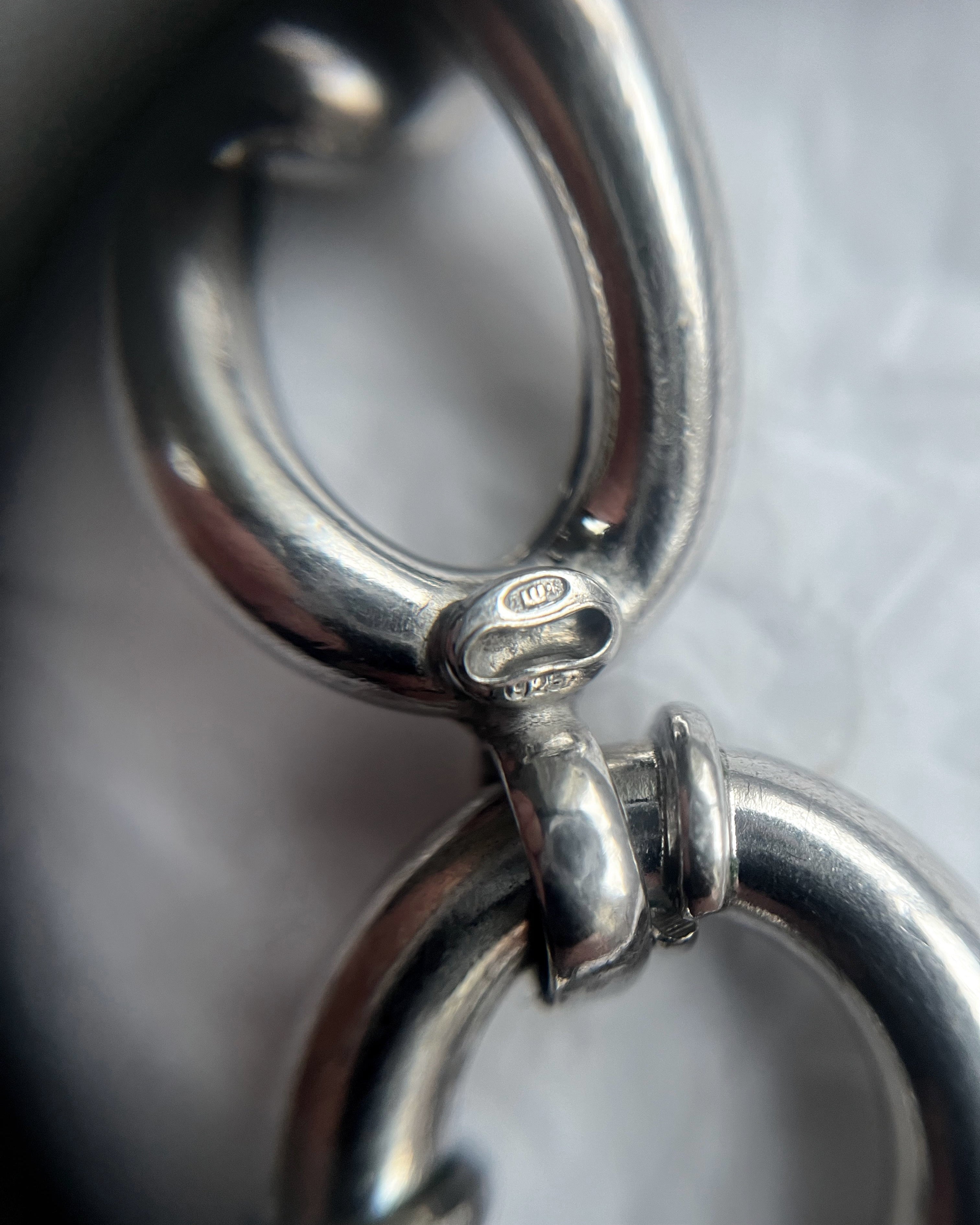 Close-up of Y2K sterling silver curb link necklace showing hallmark and maker’s mark – Auric Vintage