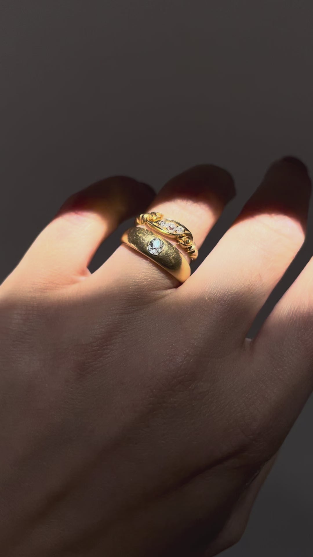 Video of Victorian diamond three stone ring in 18kt yellow gold stacked with antique solitaire diamond ring – Auric Vintage