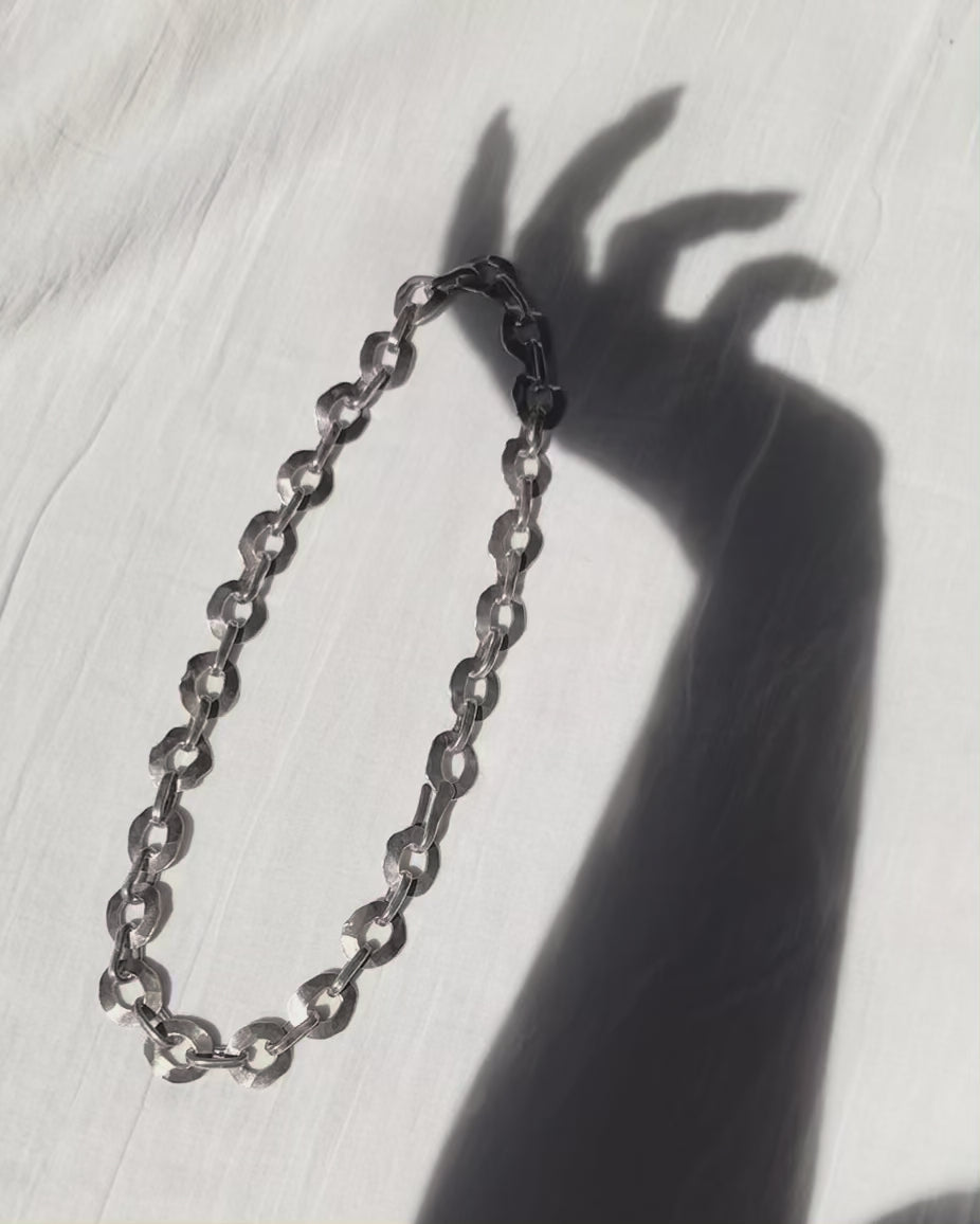 Brutalist hammered oval necklace